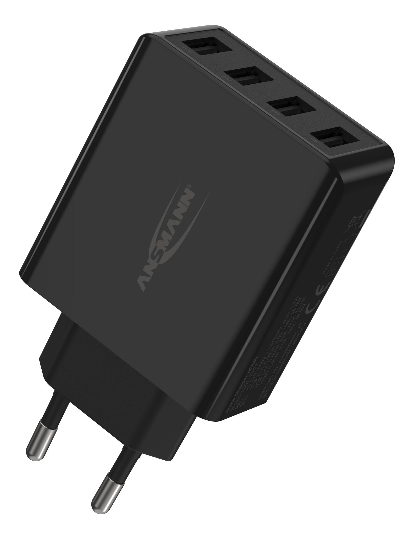 Ein schwarzer Netzadapter mit vier USB-Anschlüssen.