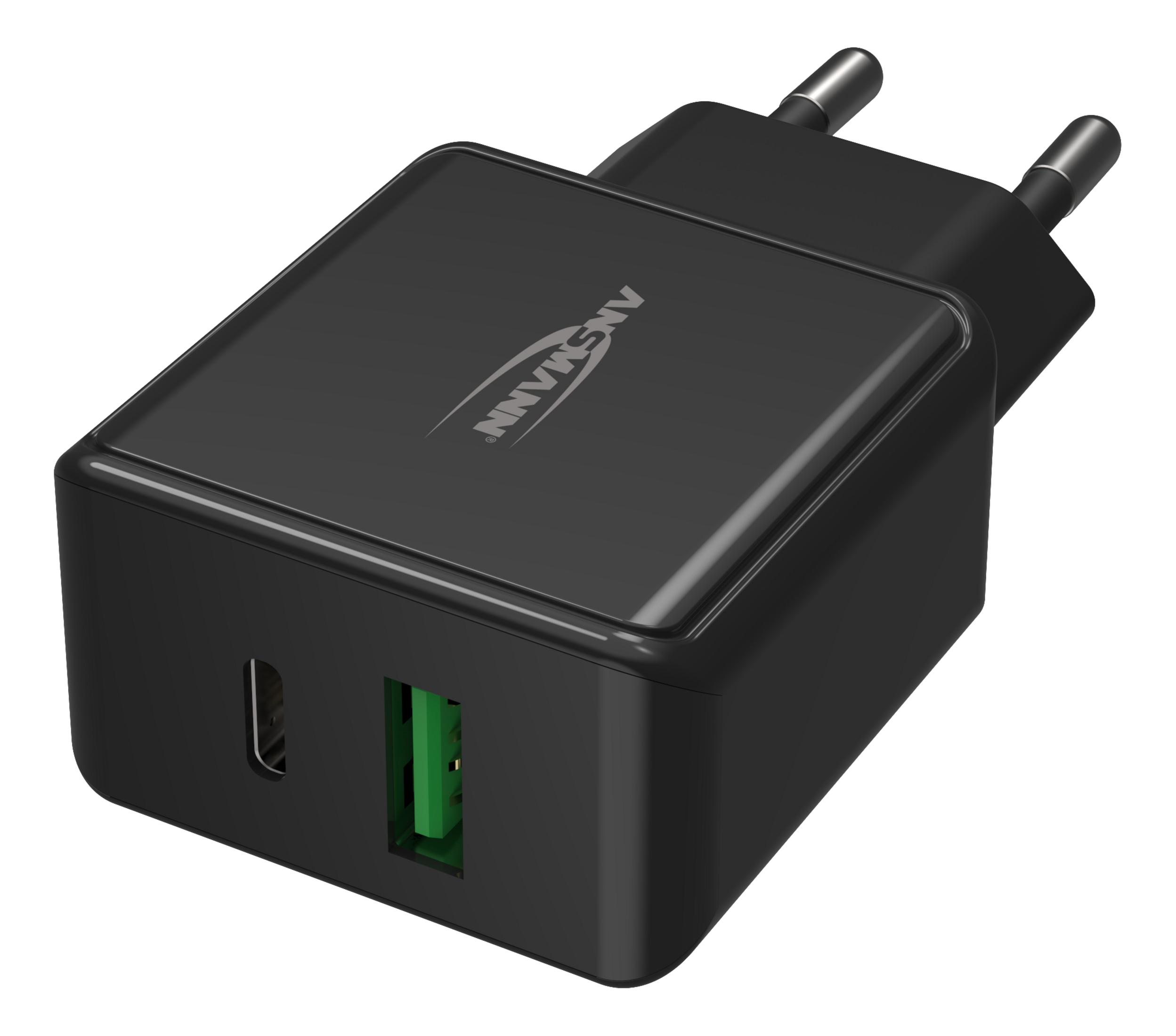 Caricabatterie nero con porta USB e USB-C, vista angolata.