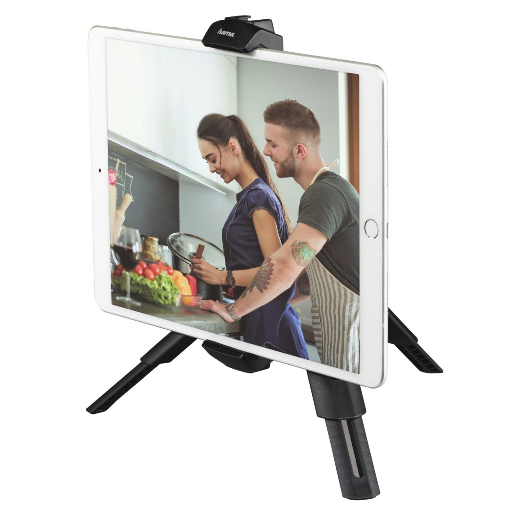 Tablet na statywie wyświetlający parę gotującą.