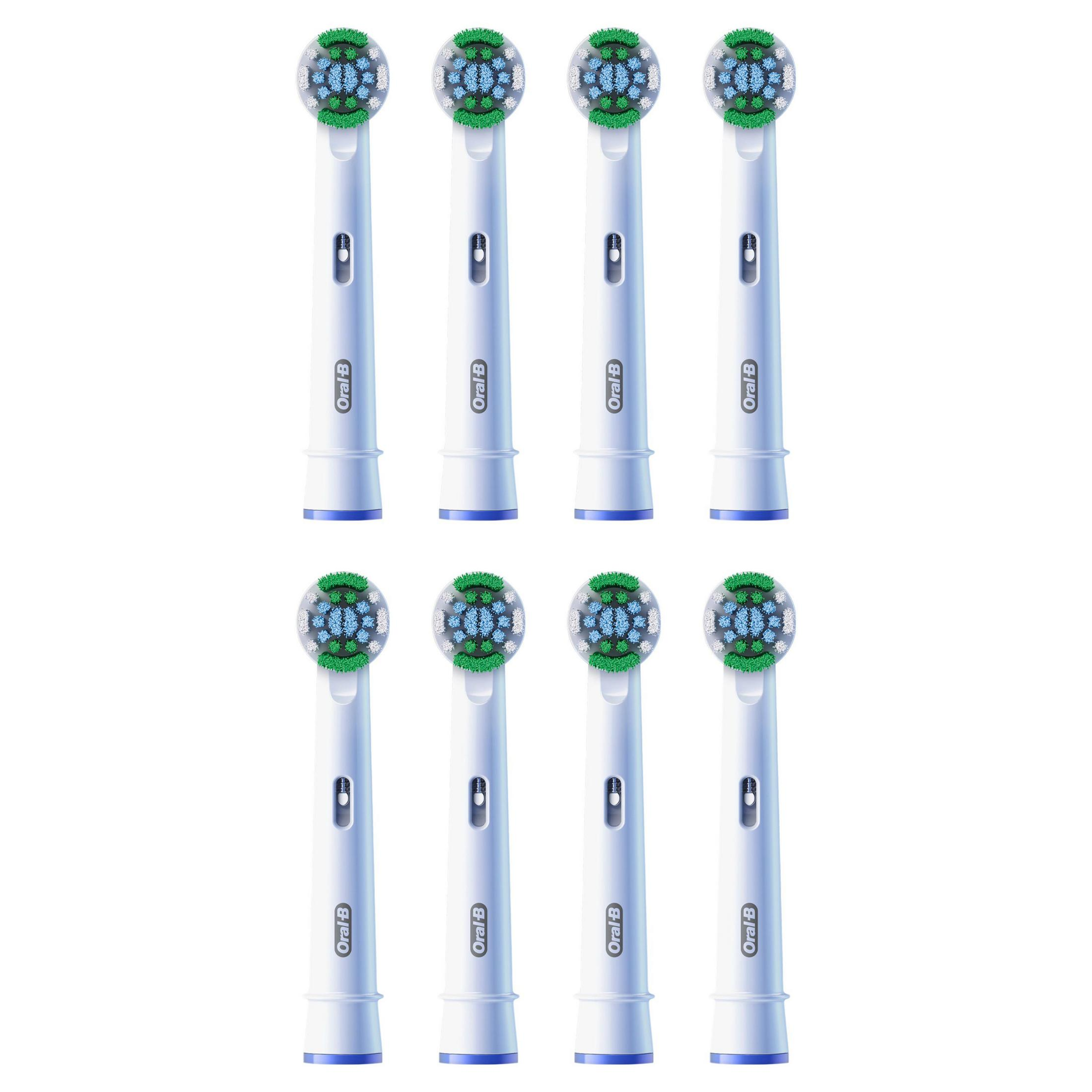 Huit têtes de brosse à dents blanches avec des poils verts et bleus, disposées en deux rangées de quatre.
