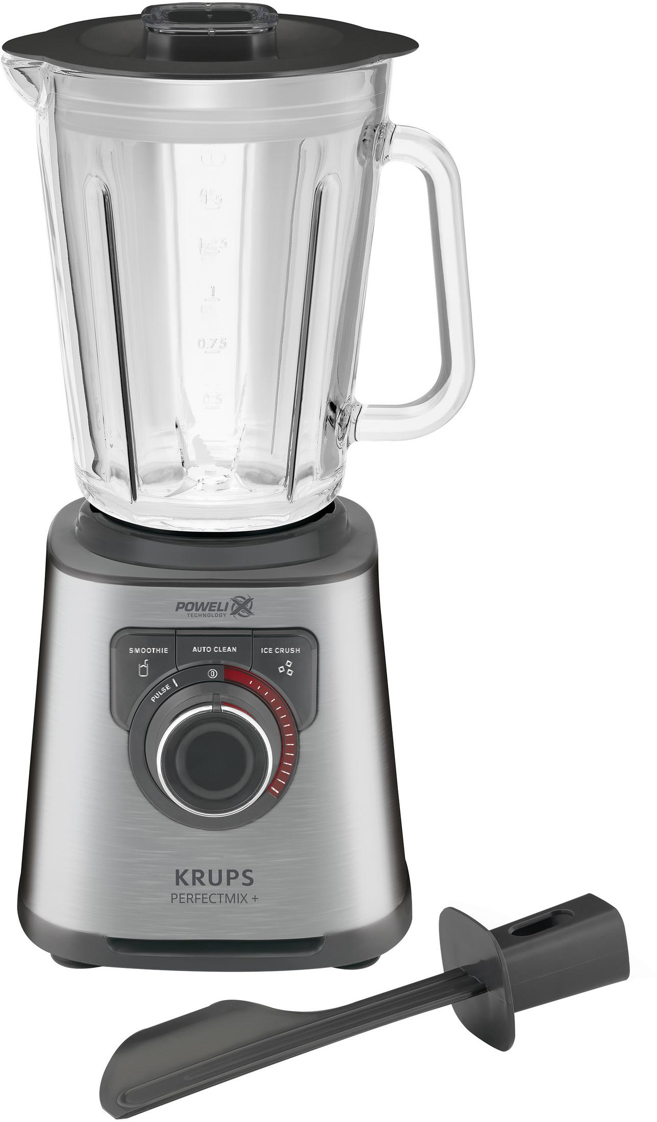 Silberner Mixer mit Glasbehälter, schwarzem Deckel und Zubehör. Die Basis hat Knöpfe.