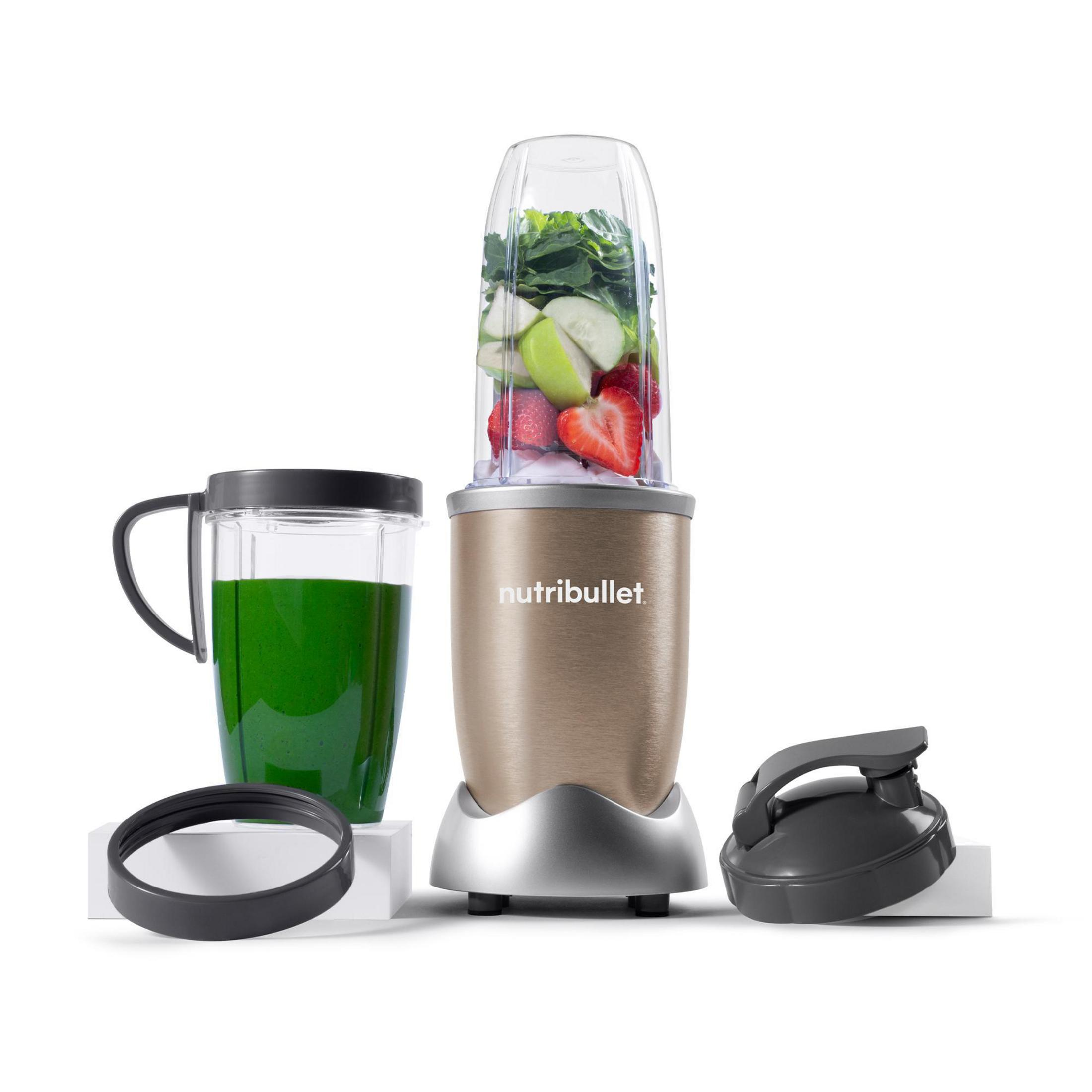 Frullatore con ingredienti per frullato verde. Include una tazza con frullato verde e un coperchio.