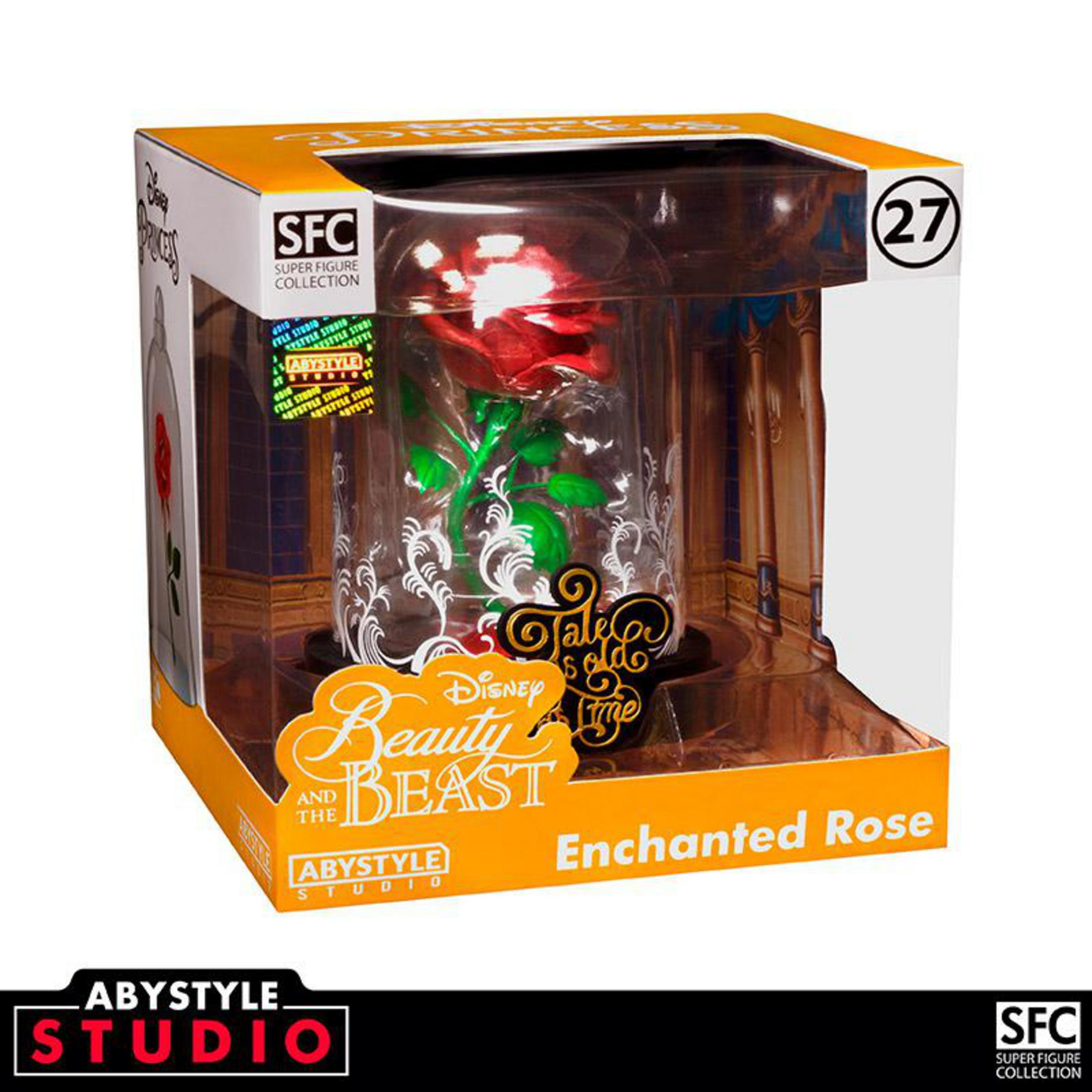 Die Schöne und das Biest Spielzeug in einer Box. Eine rote Rose ist in einem Glas.