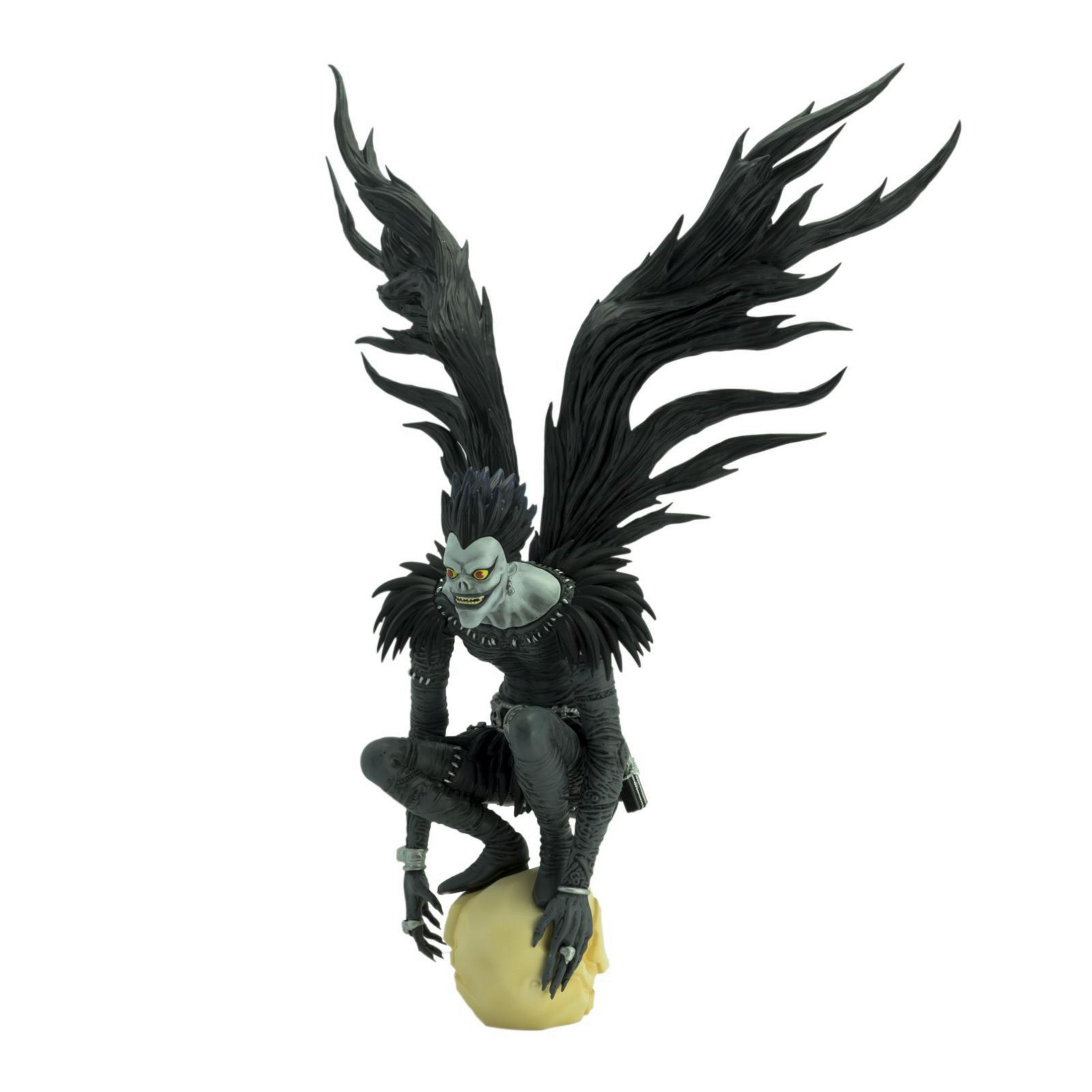 Figur von Ryuk aus Death Note, hockend auf einem Schädel, mit großen schwarzen Flügeln.