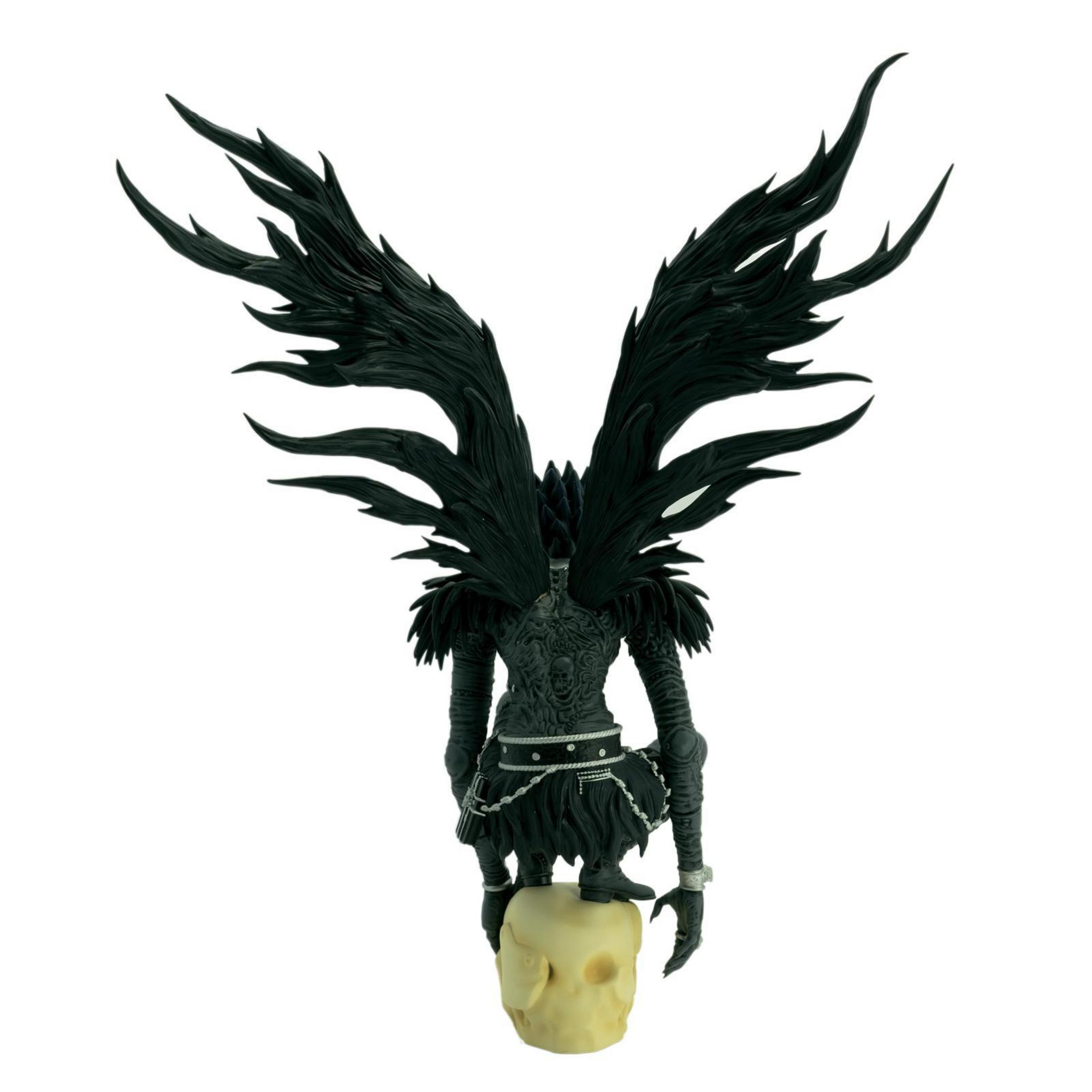 Eine schwarze Figur mit großen Flügeln, die auf einem Schädel steht. Es ist eine detaillierte Fantasy-Figur.