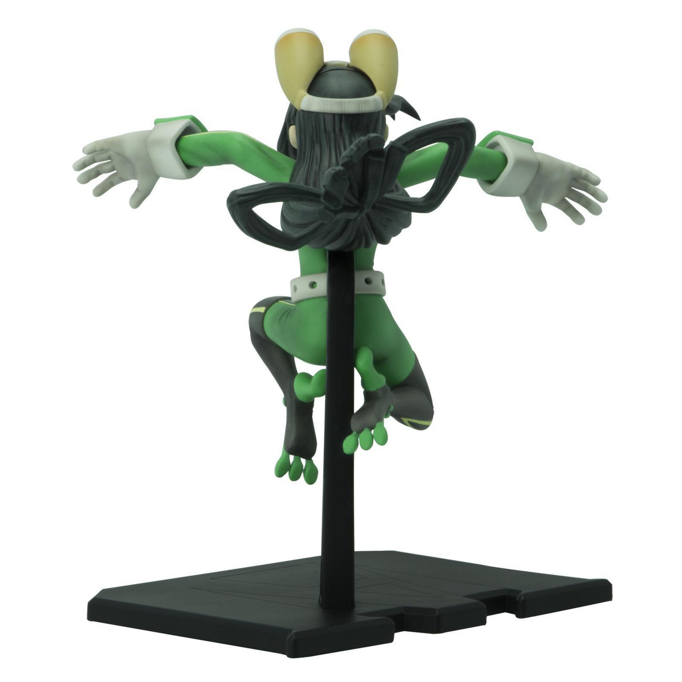 Grüne froschartige Anime-Figur in Action-Pose. Weiße Handschuhe, grüner Anzug, schwarzer Ständer.