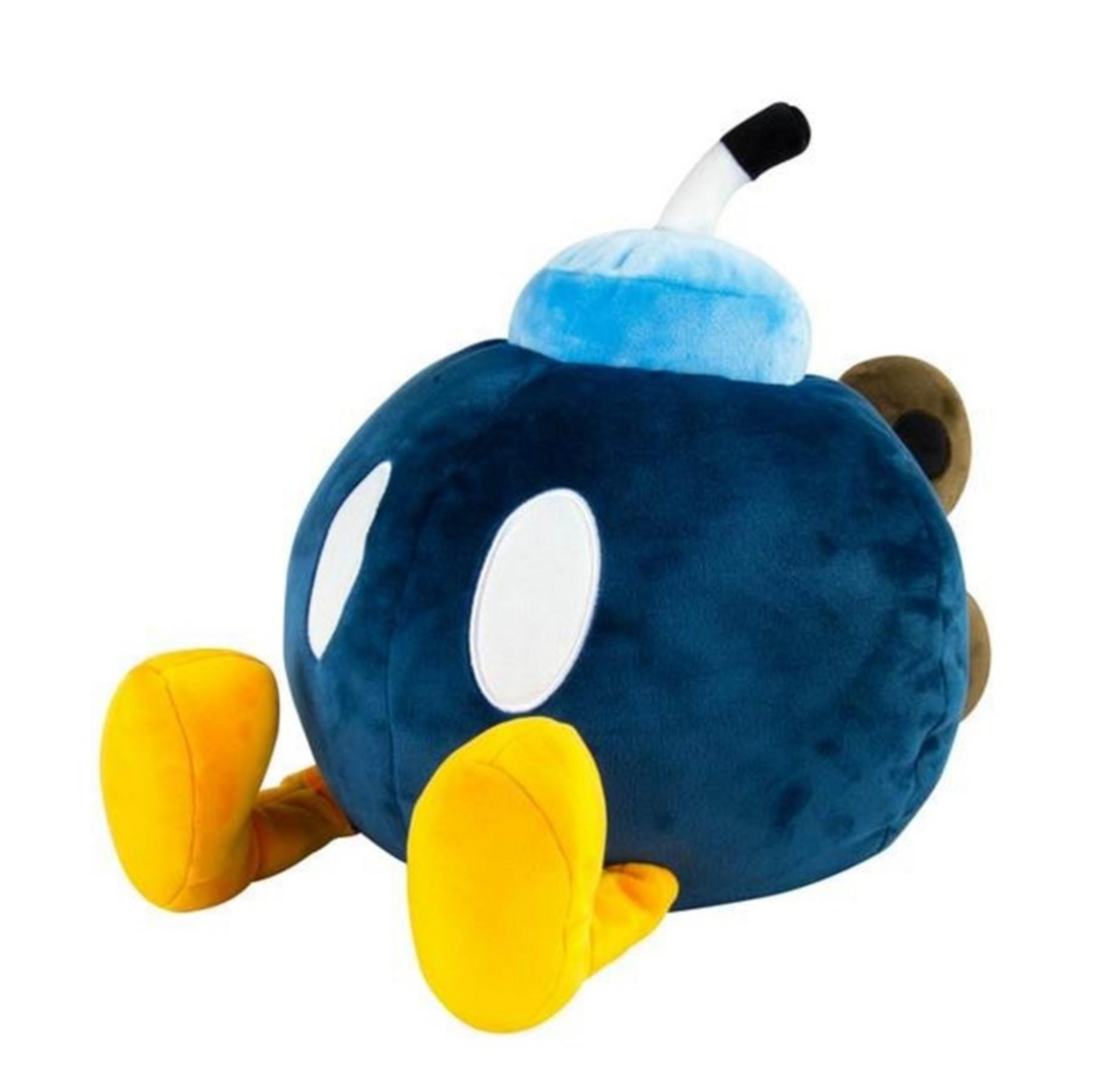 Un peluche Bomb-omb blu di Super Mario. Ha occhi bianchi e piedi gialli.