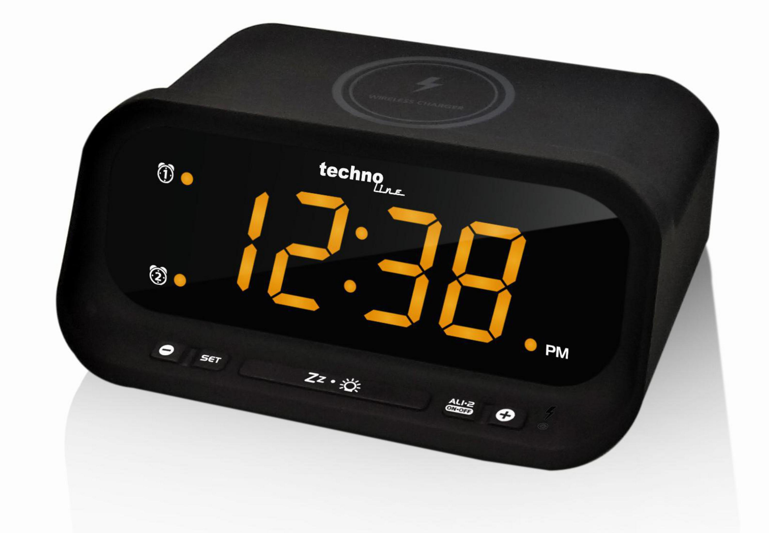 Un orologio digitale nero con cifre arancioni che mostra le 12:38 PM.