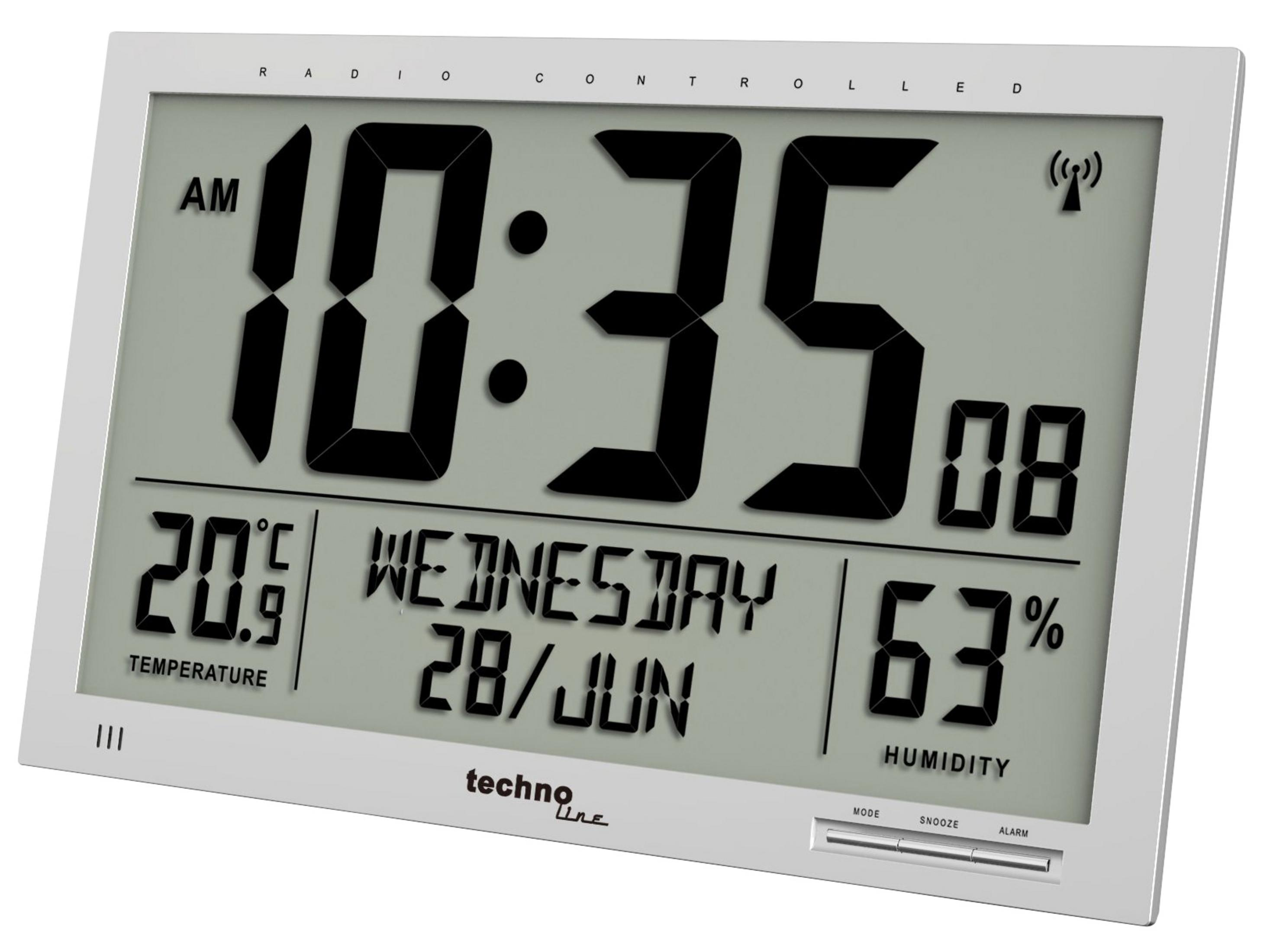 Digitaluhr mit Anzeige von Zeit, Datum, Temperatur und Luftfeuchtigkeit. Sie ist rechteckig und silberfarben.