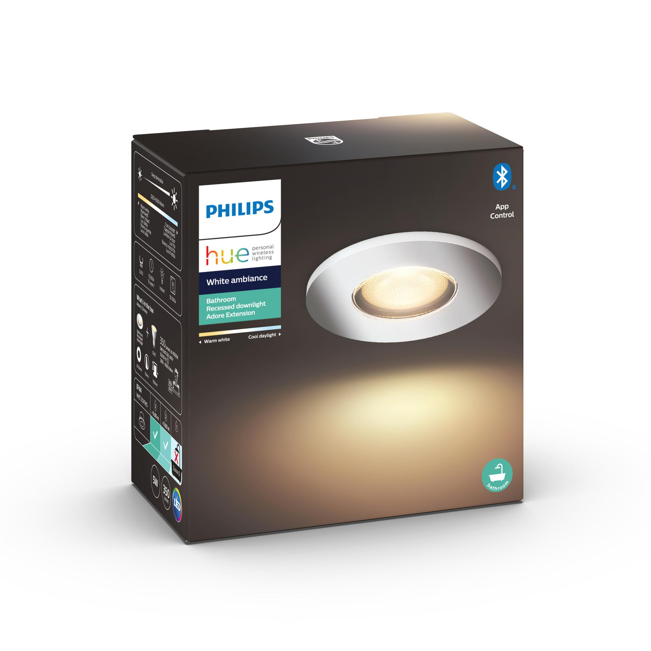 Una scatola con illuminazione Philips Hue. La scatola è bianca e nera con testo e una luce blu.