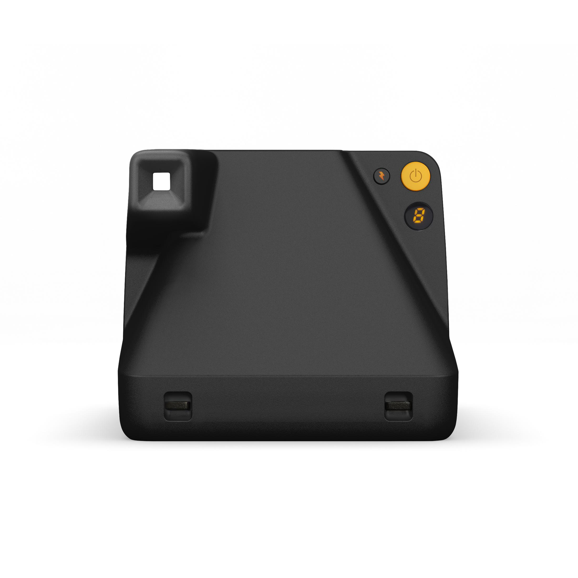 Una fotocamera istantanea Kodak nera con un pulsante di accensione giallo sopra.