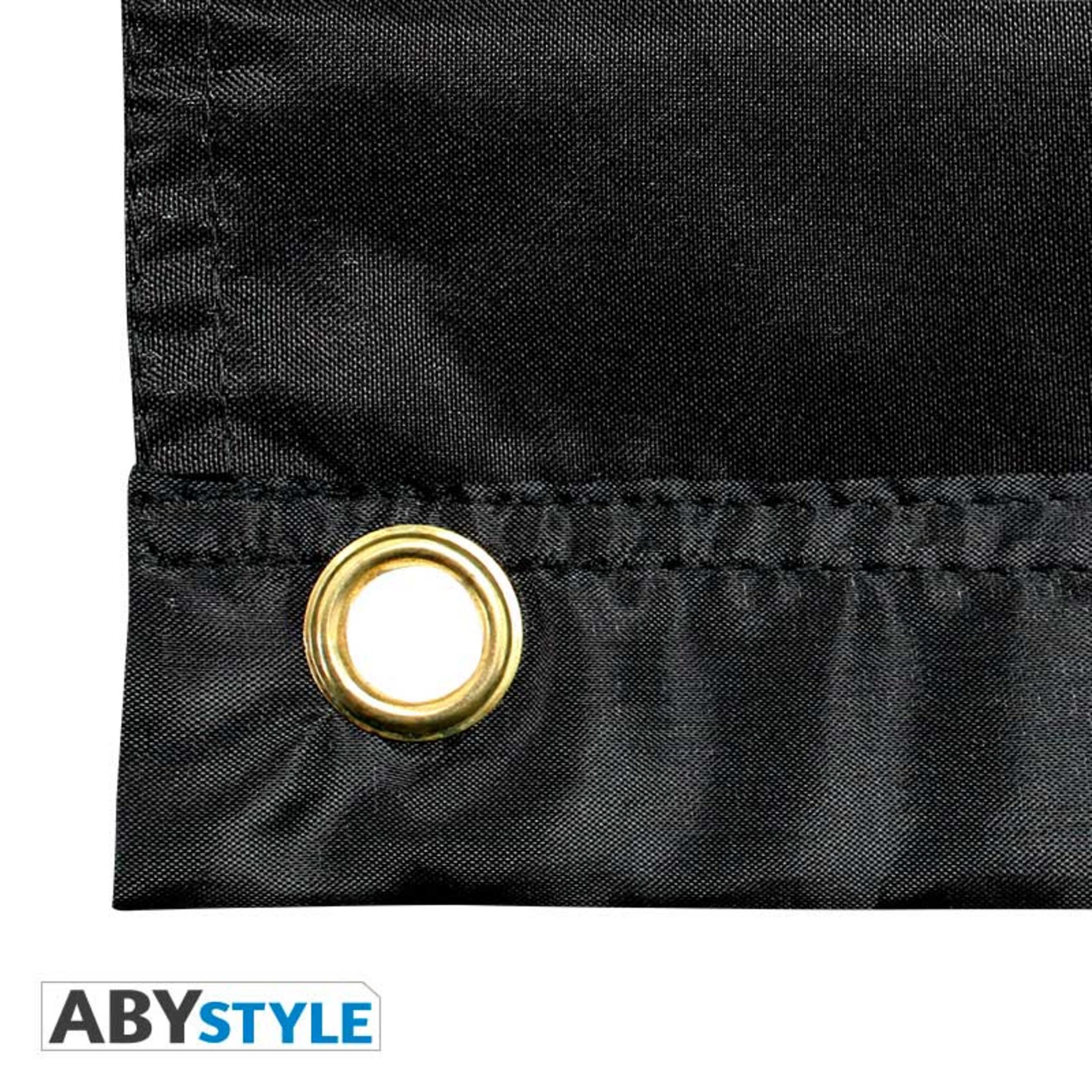 Nahaufnahme einer schwarzen Flagge mit einer Messingöse. 'ABYSTYLE' unten gedruckt.