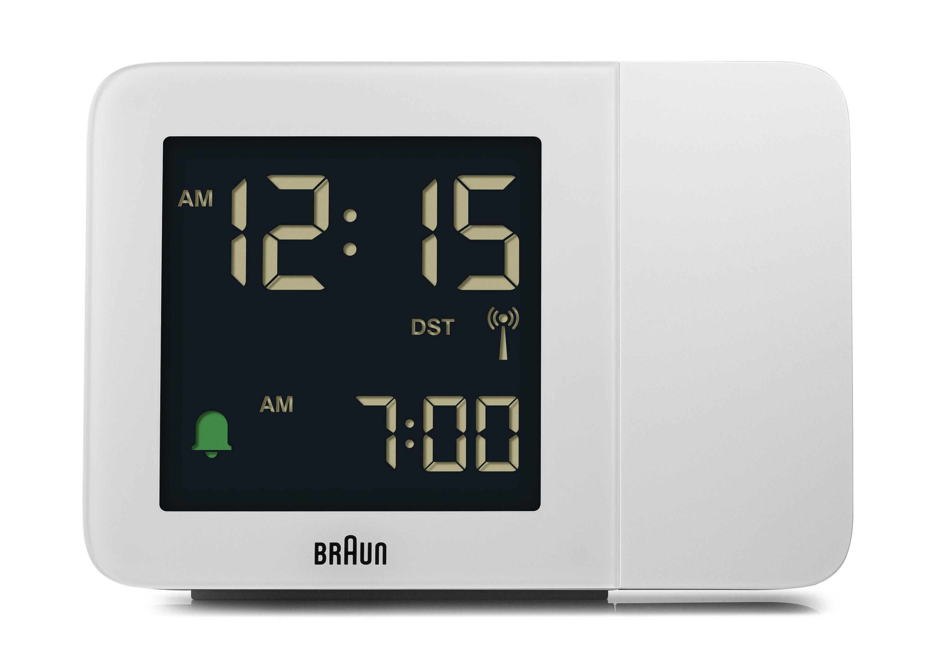 Une horloge numérique blanche affiche 12h15 et 7h00. Logo Braun en bas.