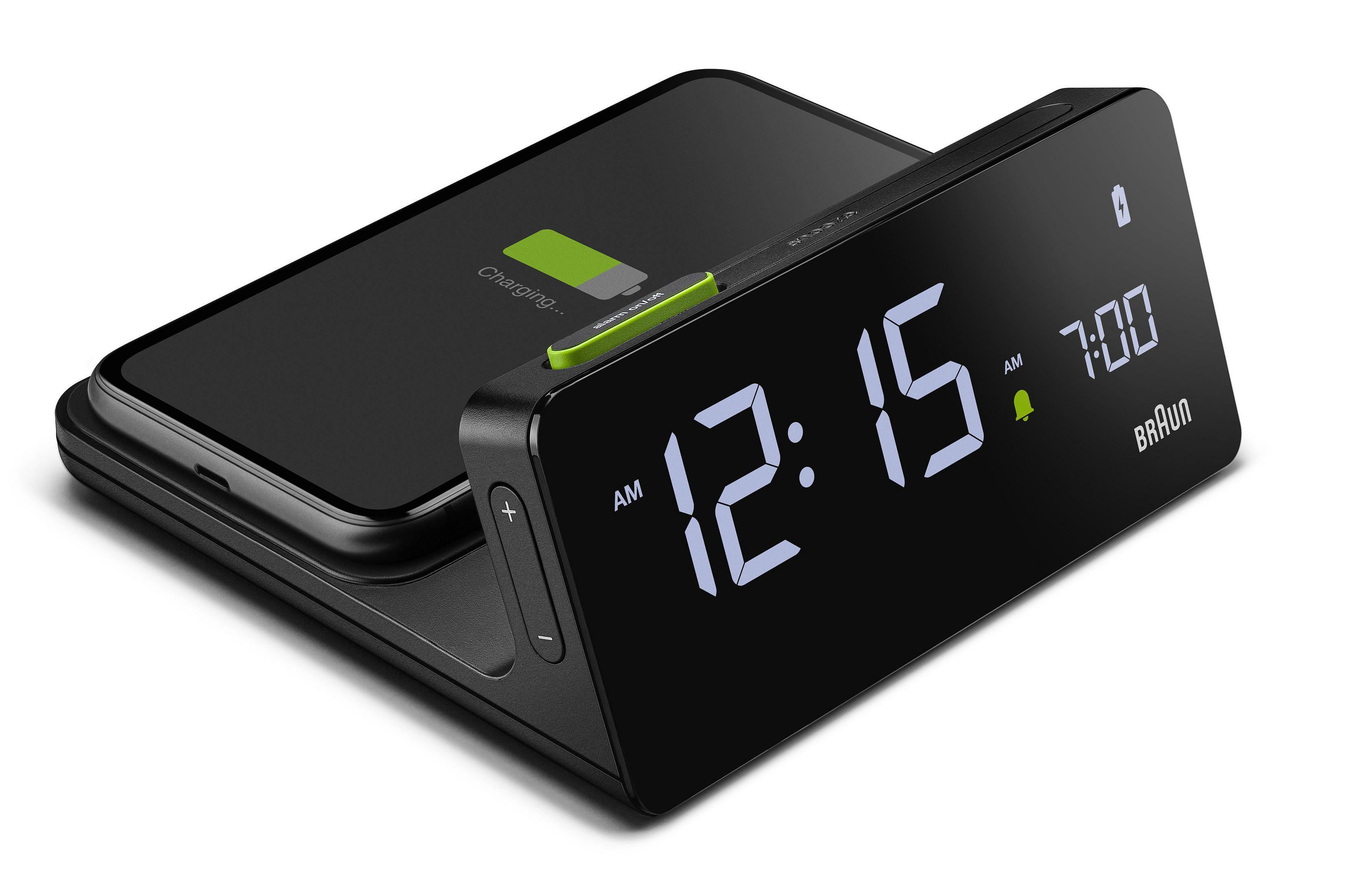 Ein schwarzer Wecker mit Telefon, zeigt 12:15 AM an.
