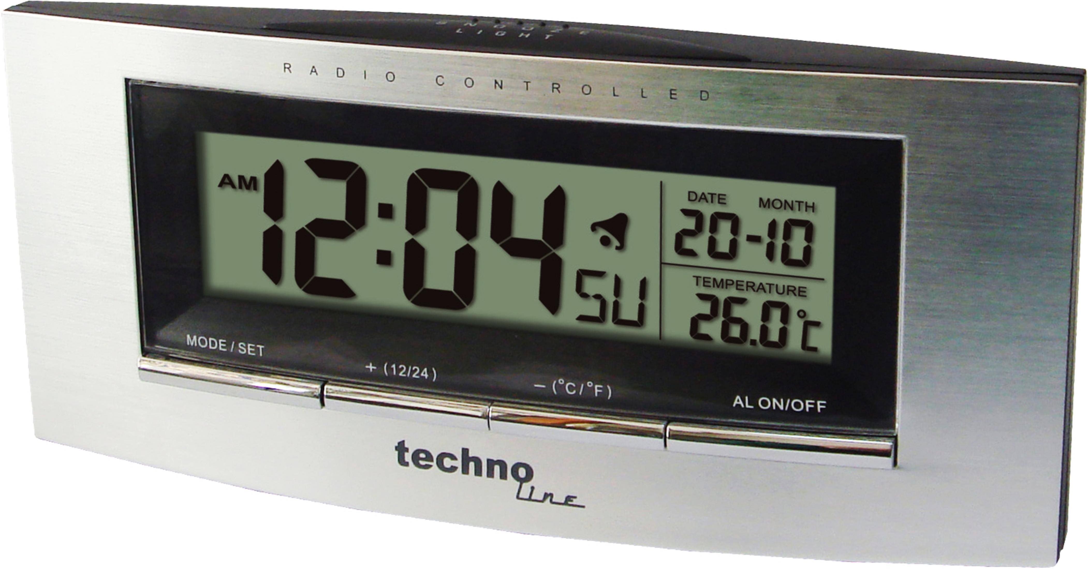 Un orologio techno line digitale radiocontrollato con cornice argentata, che mostra ora, data e temperatura.