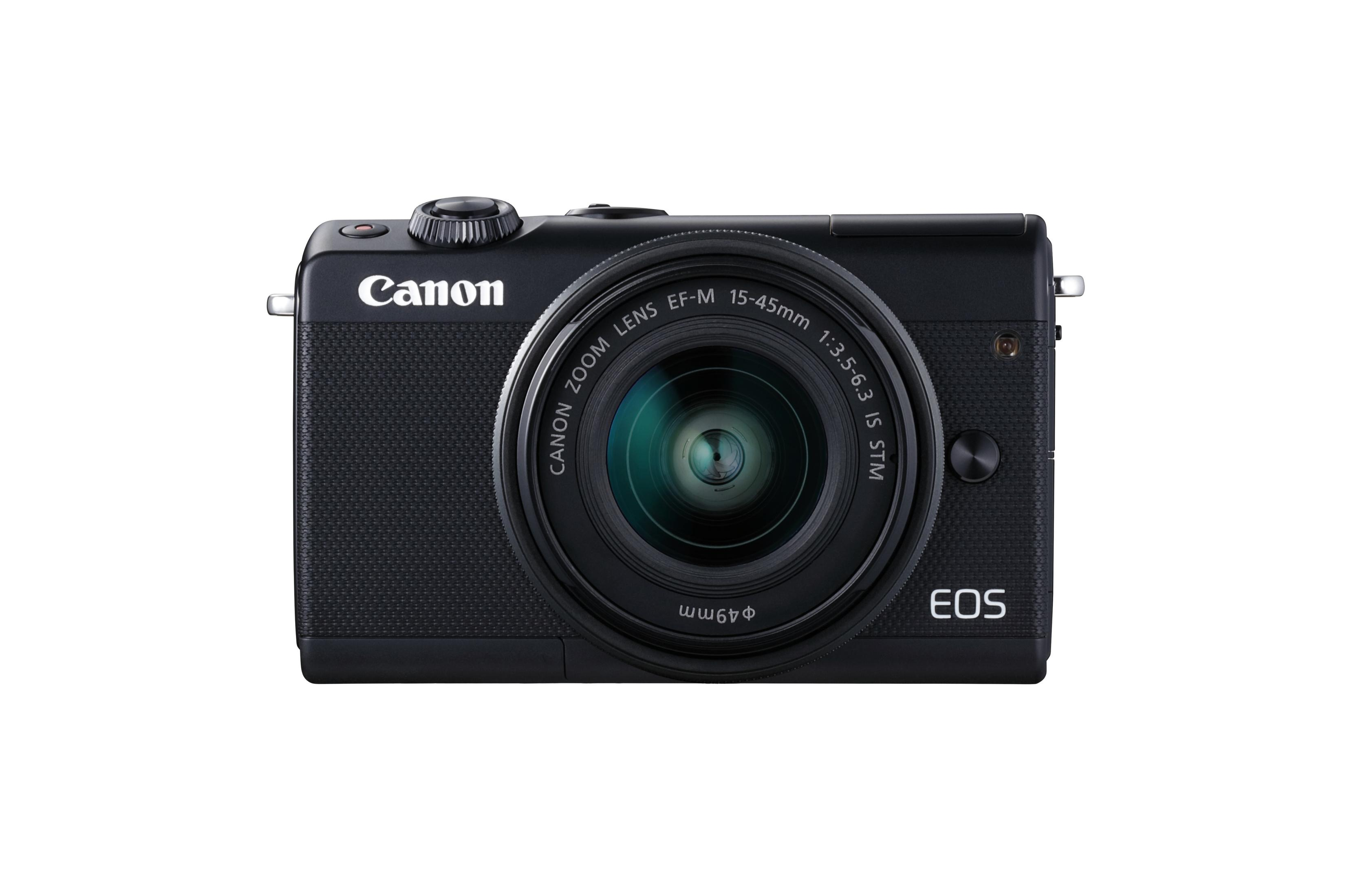 Eine schwarze Canon EOS Kamera mit Objektiv. Die Kamera ist auf weißem Hintergrund.
