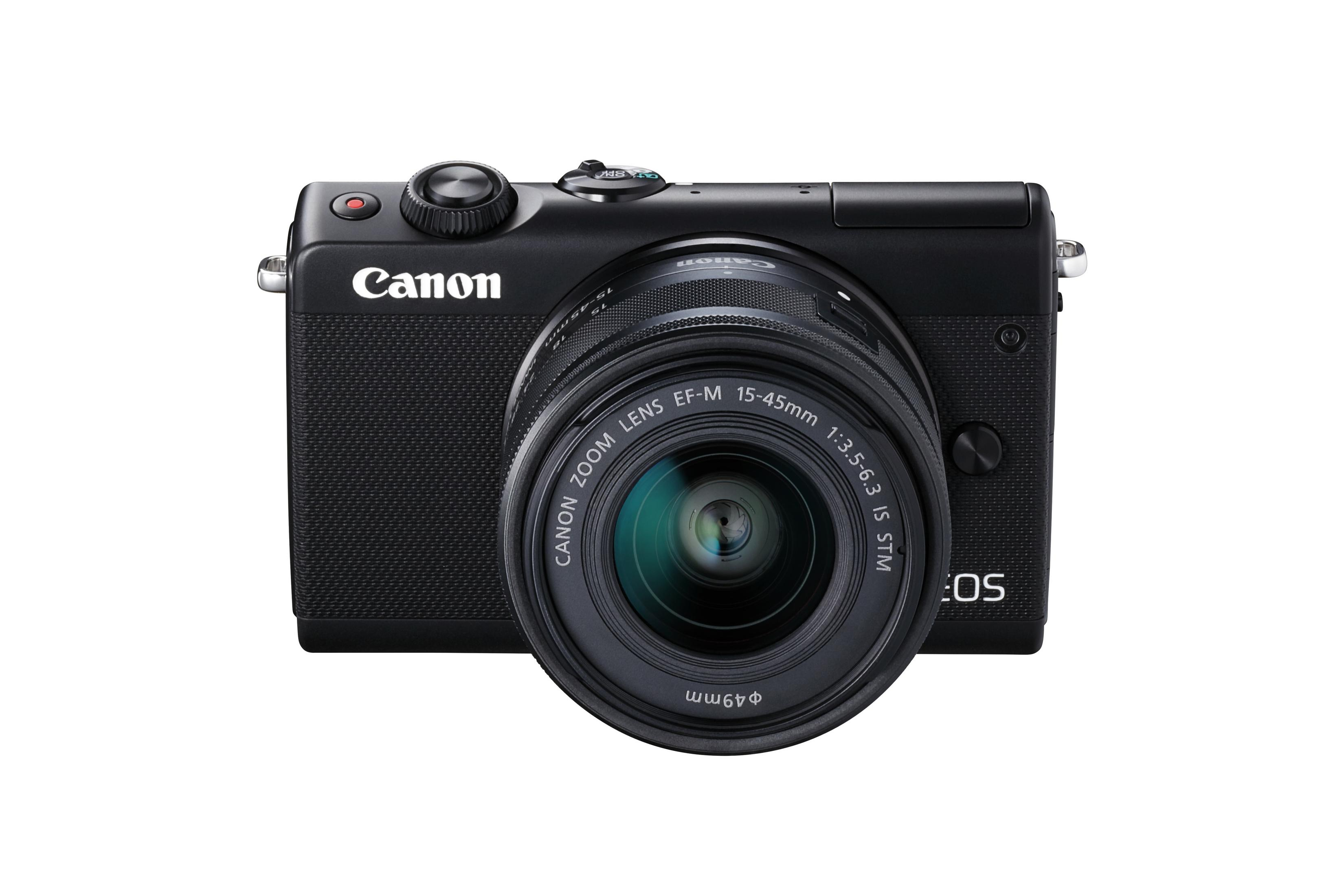 Schwarze Canon Kamera mit Objektiv, weißer Hintergrund. Canon Logo sichtbar.