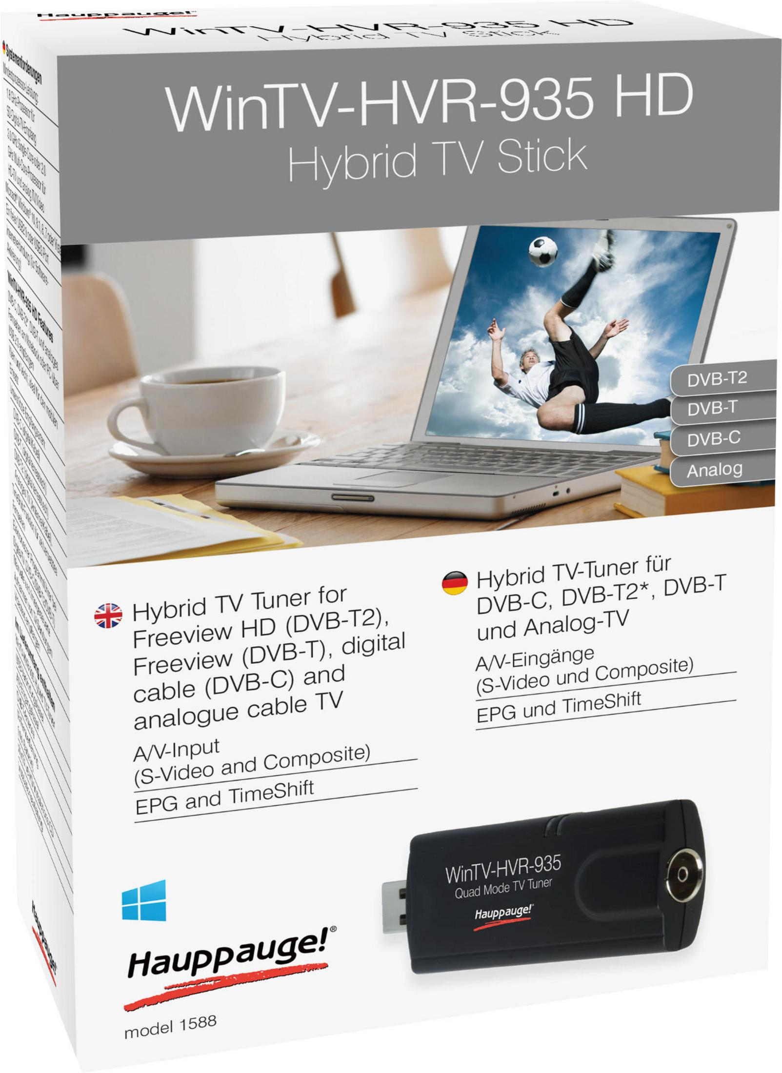 Eine weiße und schwarze Box mit einem TV-Tuner-Stick. Die Box hat Bilder eines Fußballspiels und eines Laptops.