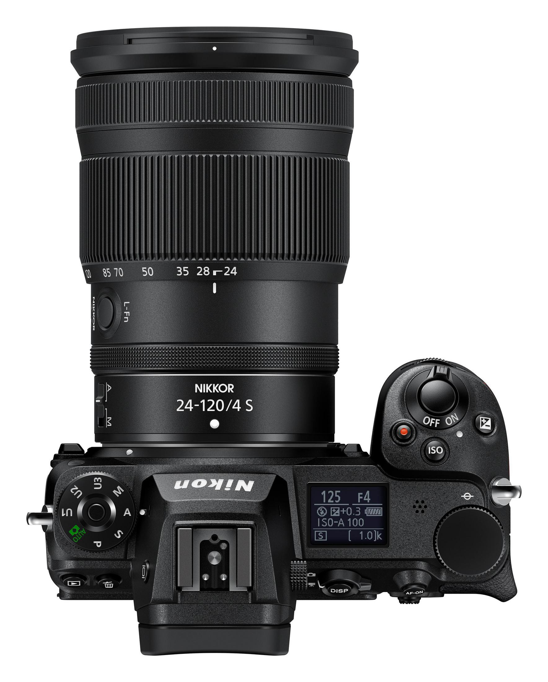 Draufsicht auf eine schwarze Nikon-Kamera mit großem Objektiv. Knöpfe und ein Bildschirm sichtbar.