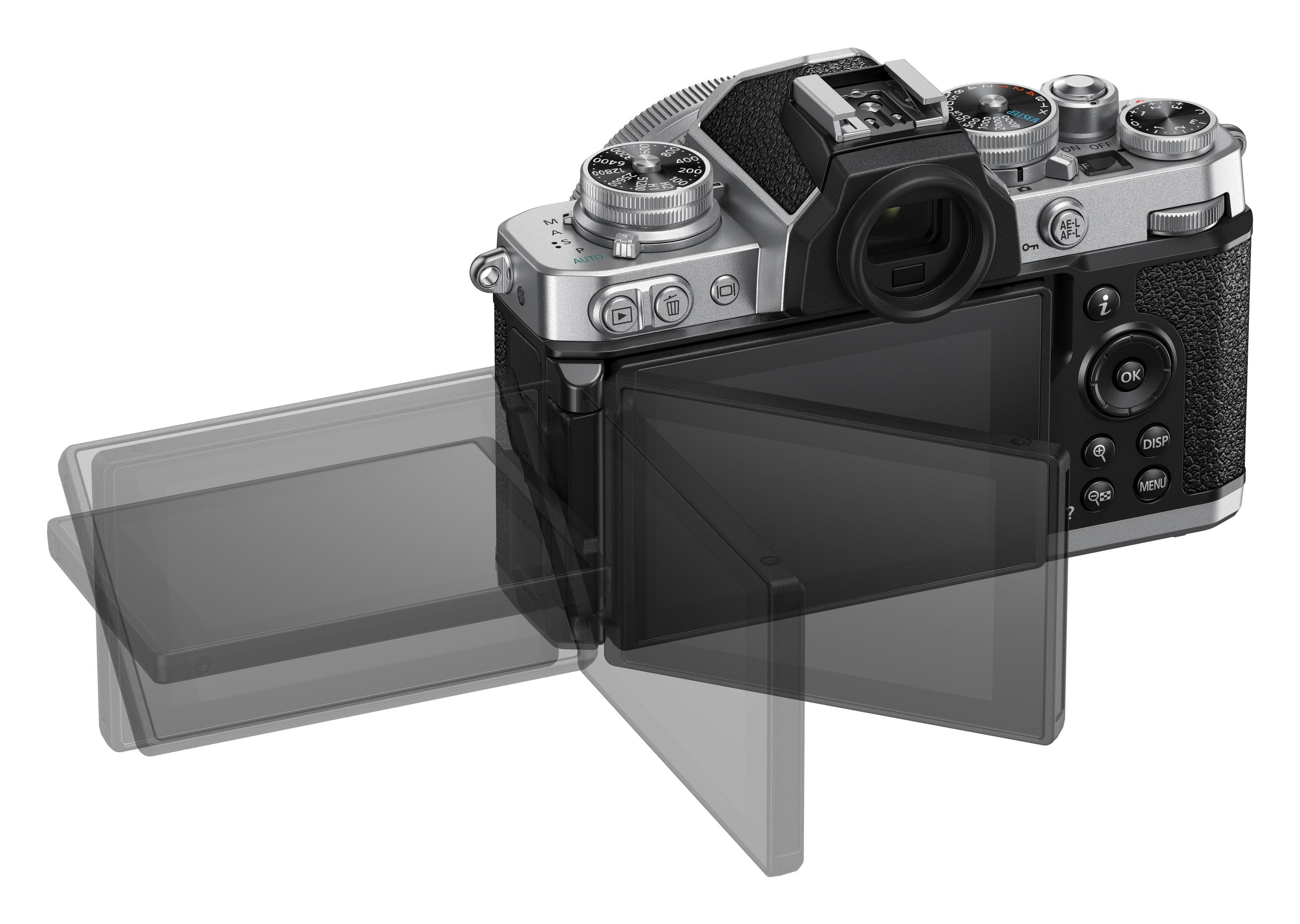 Zilveren en zwarte camera met open scherm. Knoppen en draaiknoppen zichtbaar.