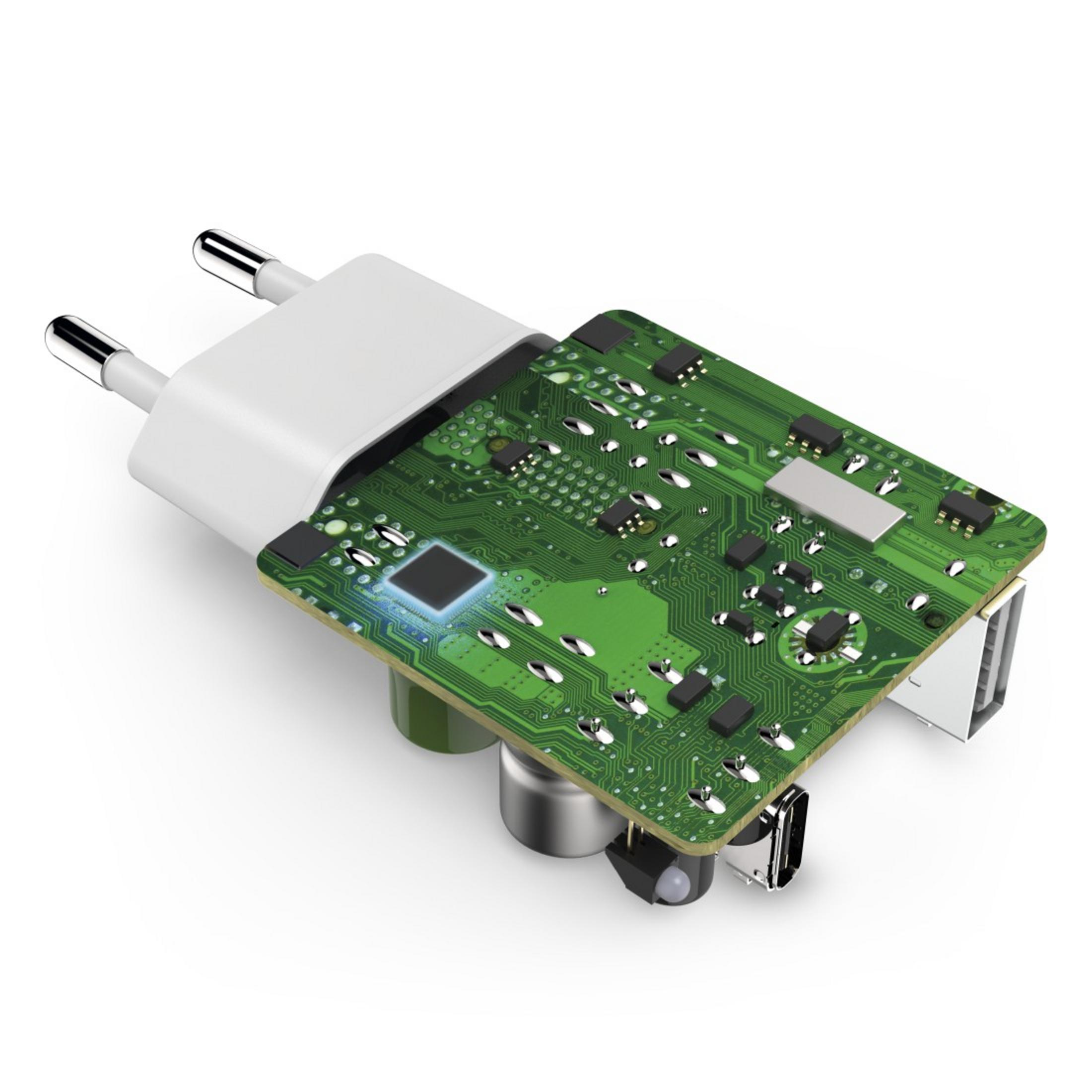 Ein Ladegerät mit grüner Platine, weißen Stiften und einem USB-Anschluss.