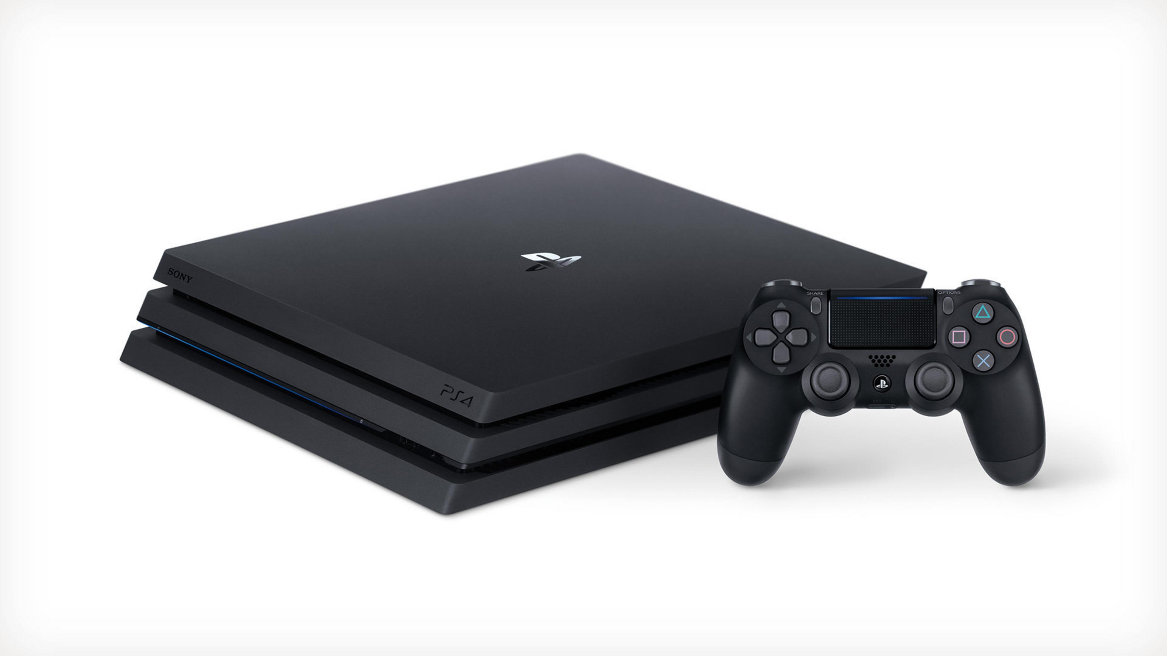 Zwarte PS4 console en controller op een wit oppervlak. Console links.