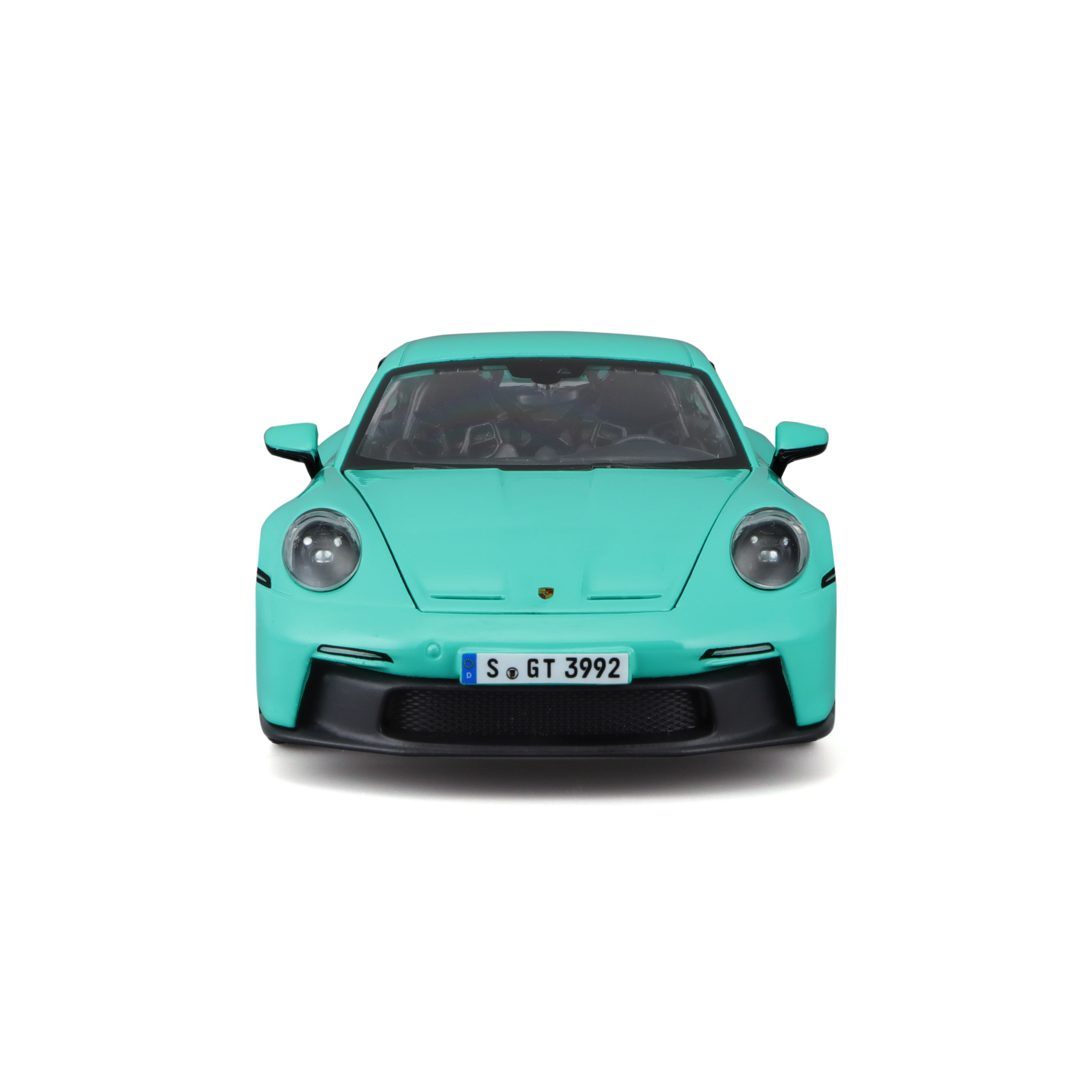 Turkusowy samochód sportowy, przodem. Samochód ma czarny grill, a tablica rejestracyjna to S GT 3992.