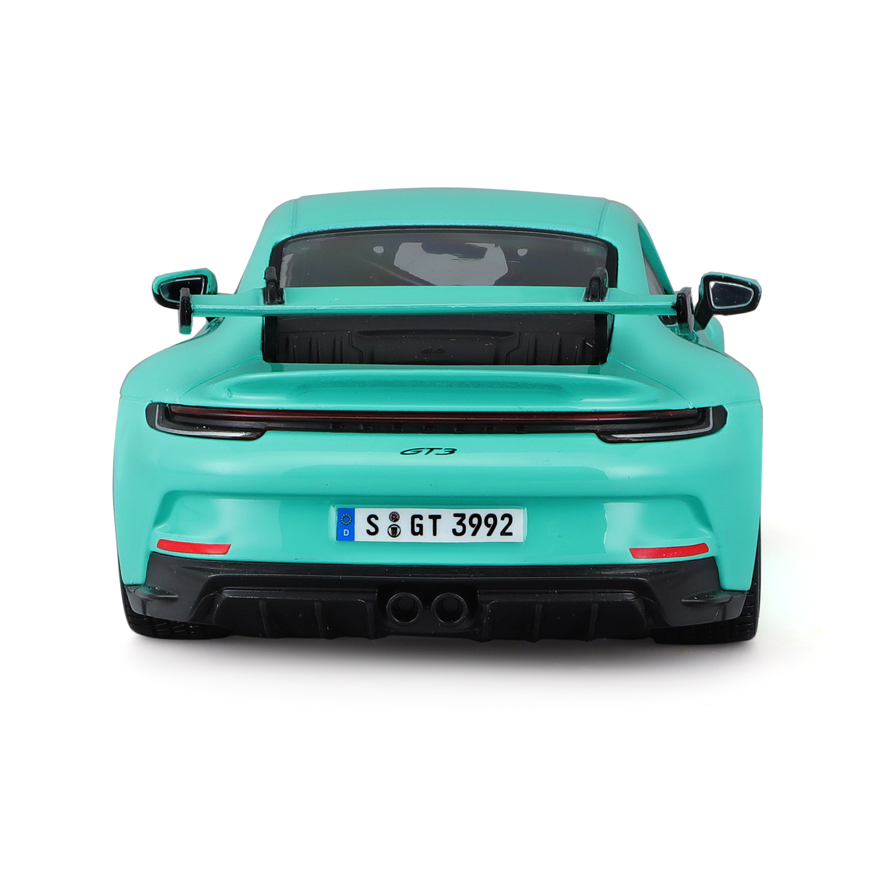 Turkusowy model samochodu Porsche z tyłu. Tablica rejestracyjna mówi S GT 3992.