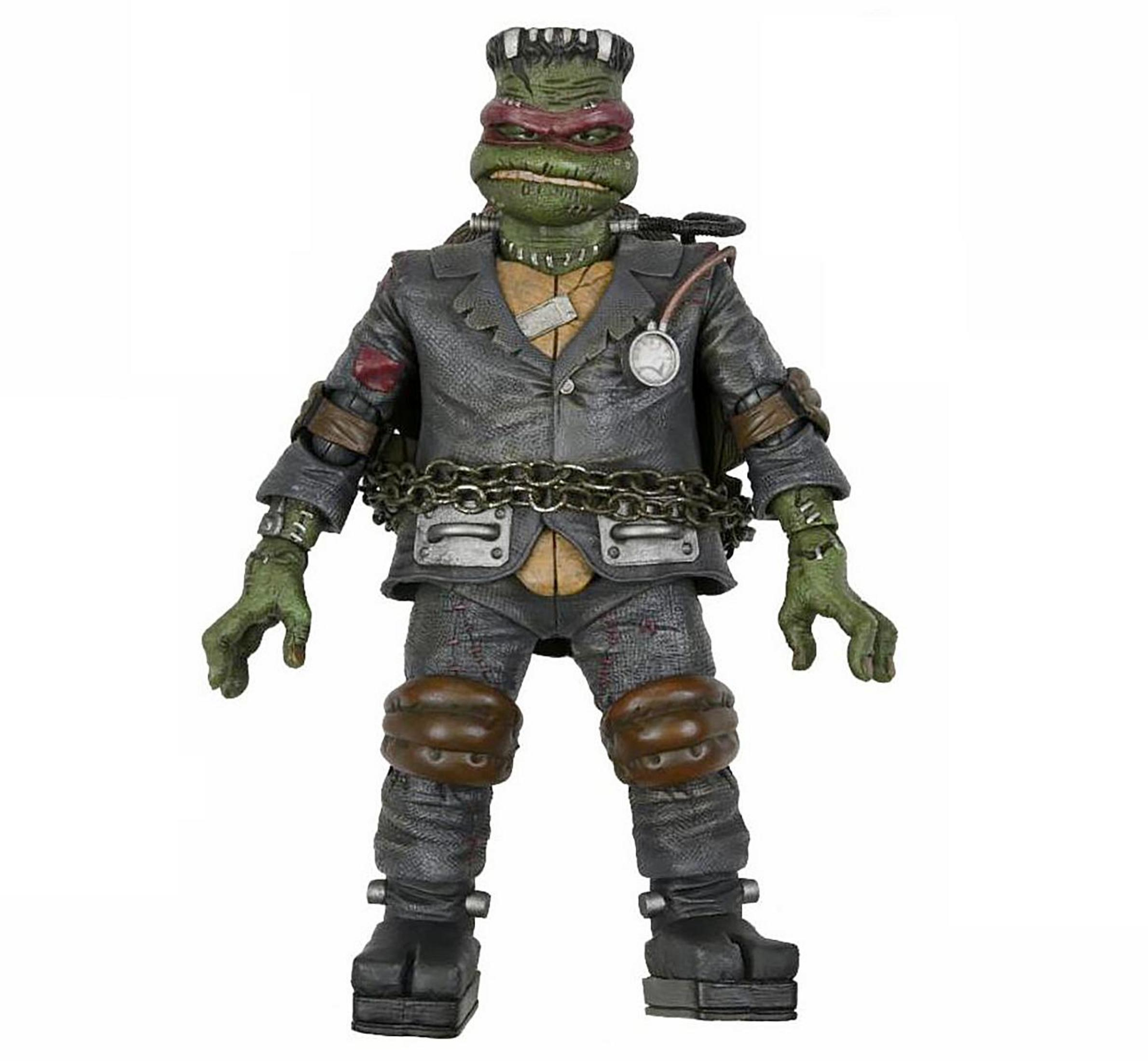 Frankensteins Monster Actionfigur mit Ketten und genähter Kleidung. Grüne Haut, grauer Anzug.