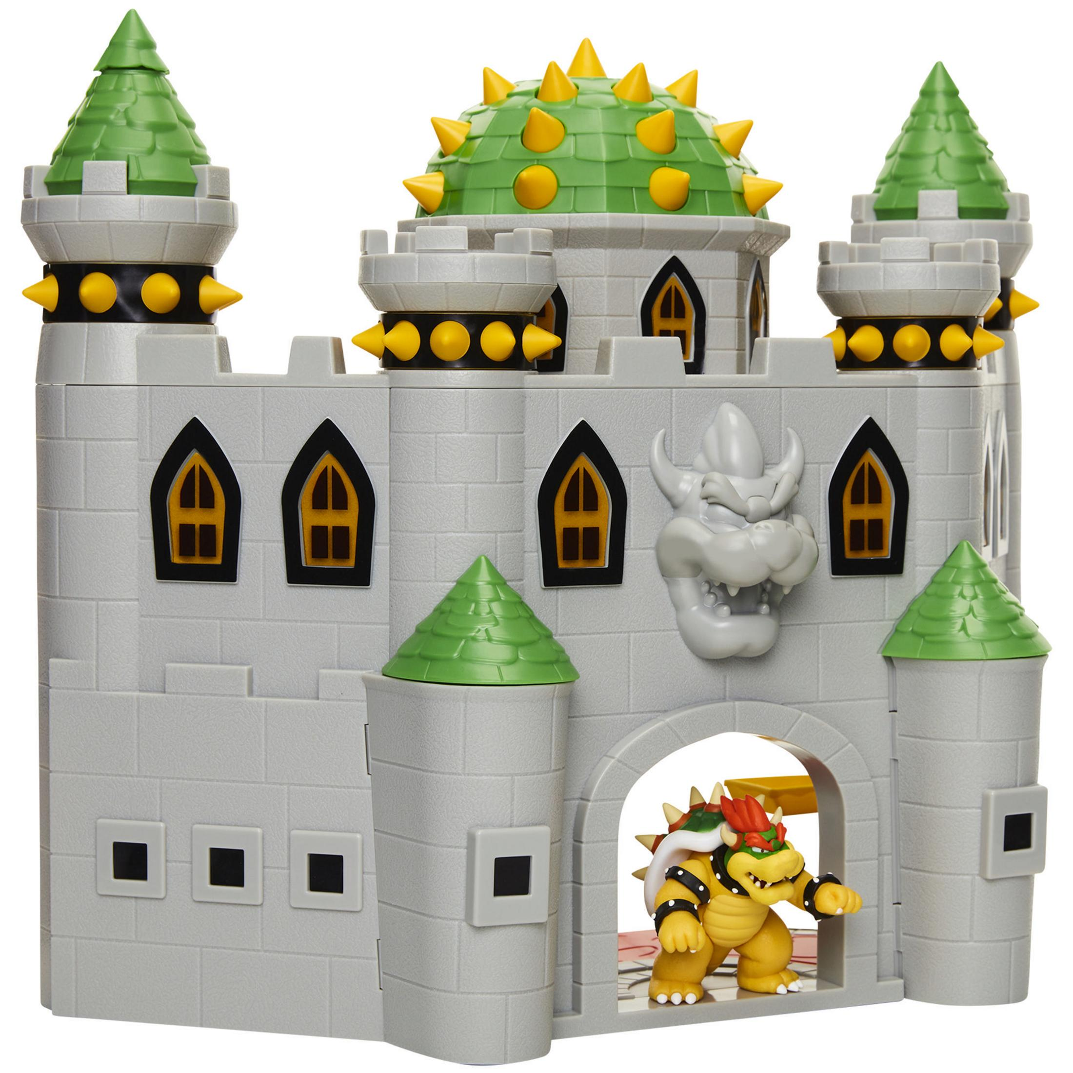 Ein Spielzeugschloss mit Bowser am Eingang. Das Schloss hat grüne und graue Merkmale.