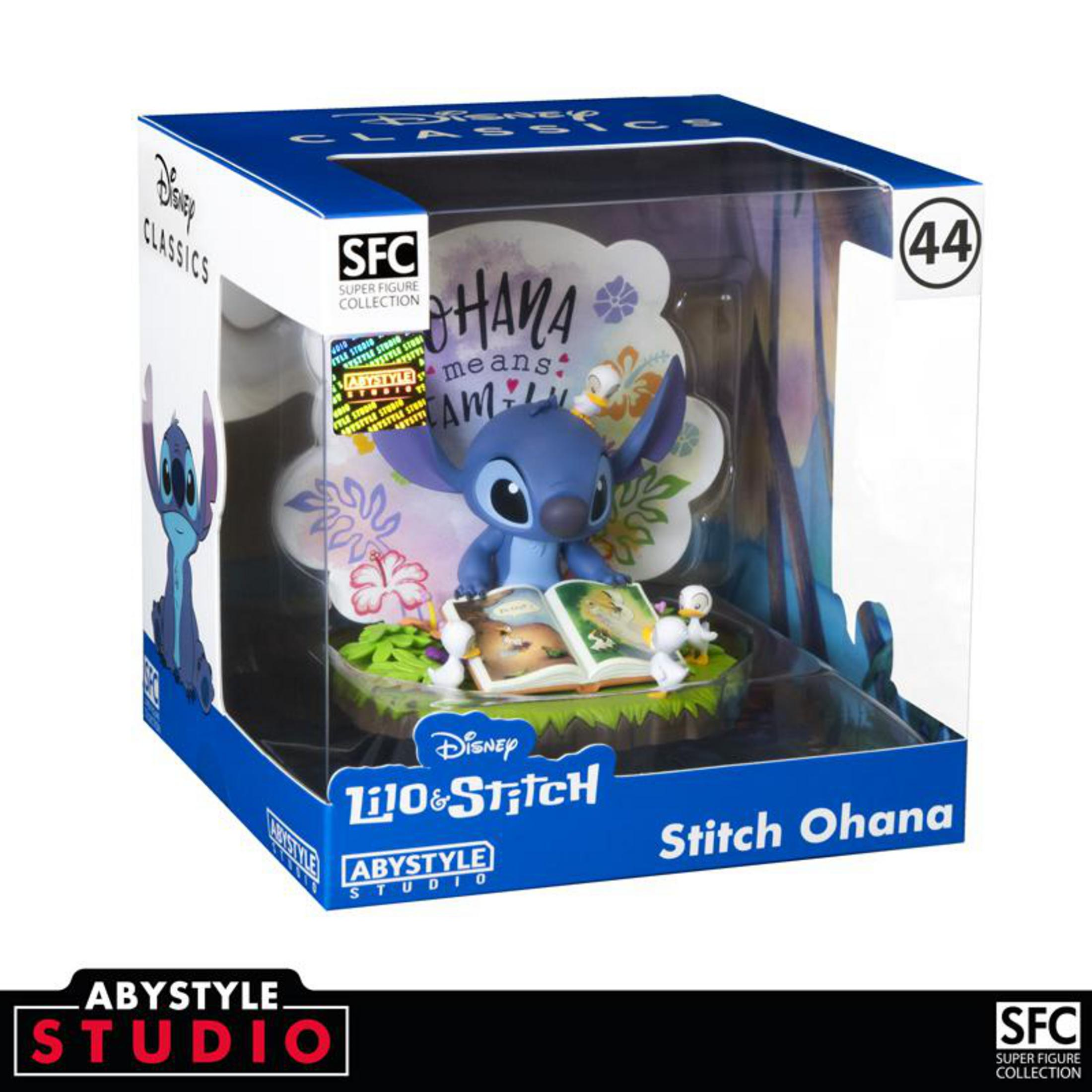 Lilo & Stitch Figur in einer Box. Stitch liest auf einer Basis mit Blumen.