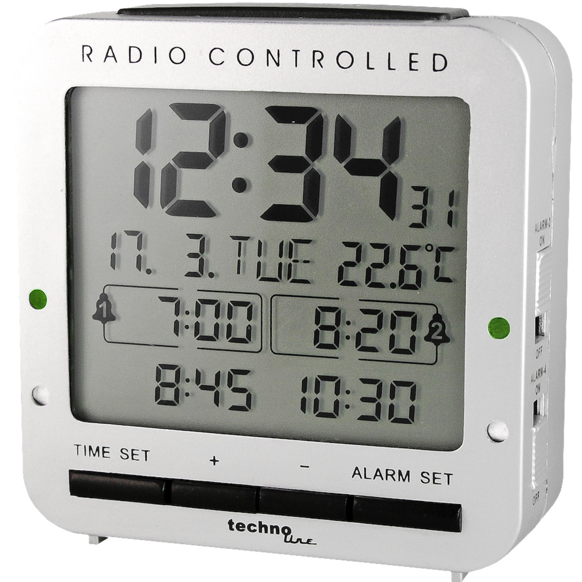 Eine funkgesteuerte Digitaluhr zeigt Zeit, Datum und Temperatur an. Tasten sind für Zeit und Wecker eingestellt, mit grünen Kontrollleuchten.