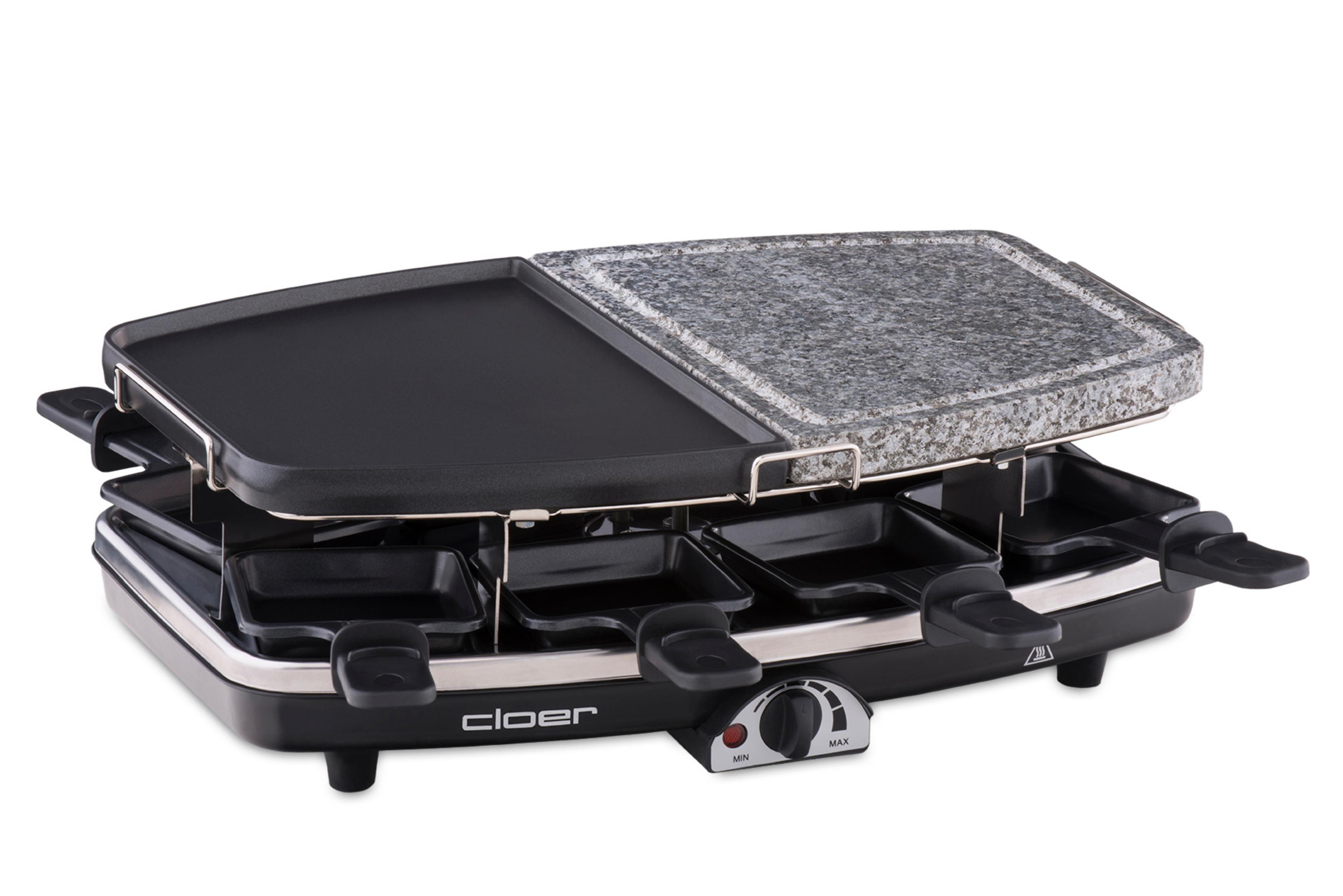 Ein schwarzer Raclette-Grill mit zwei Kochflächen und vier einzelnen Käsepfannen.