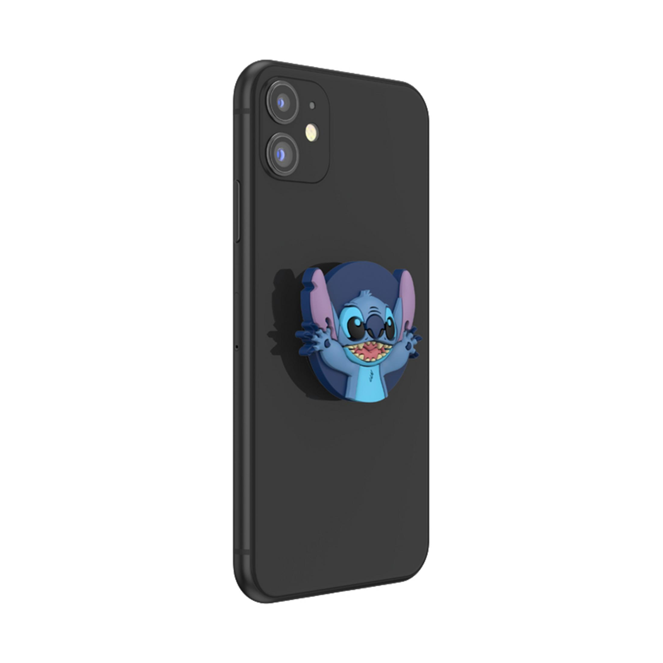 Un telefono nero con un pop socket di Stitch attaccato, che mostra la faccia e le mani di Stitch.