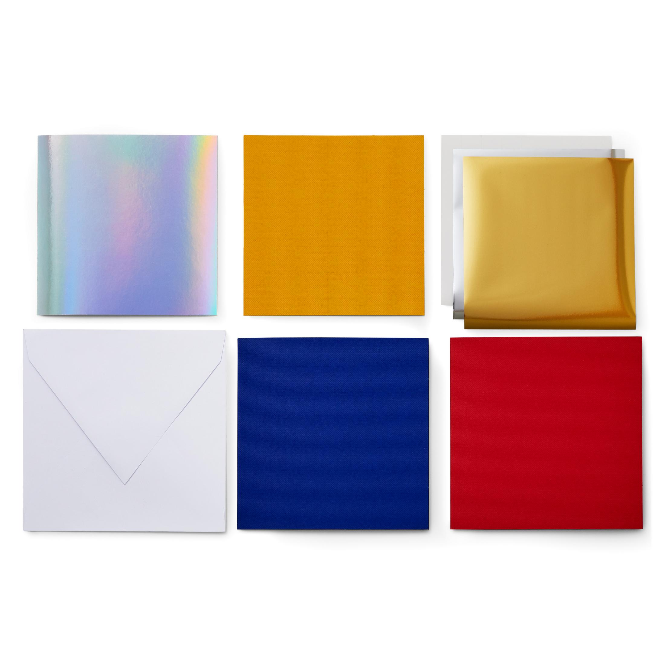 Sechs bunte Papiere quadratisch angeordnet: holografisch, gelb, gold, weiß, blau und rot.