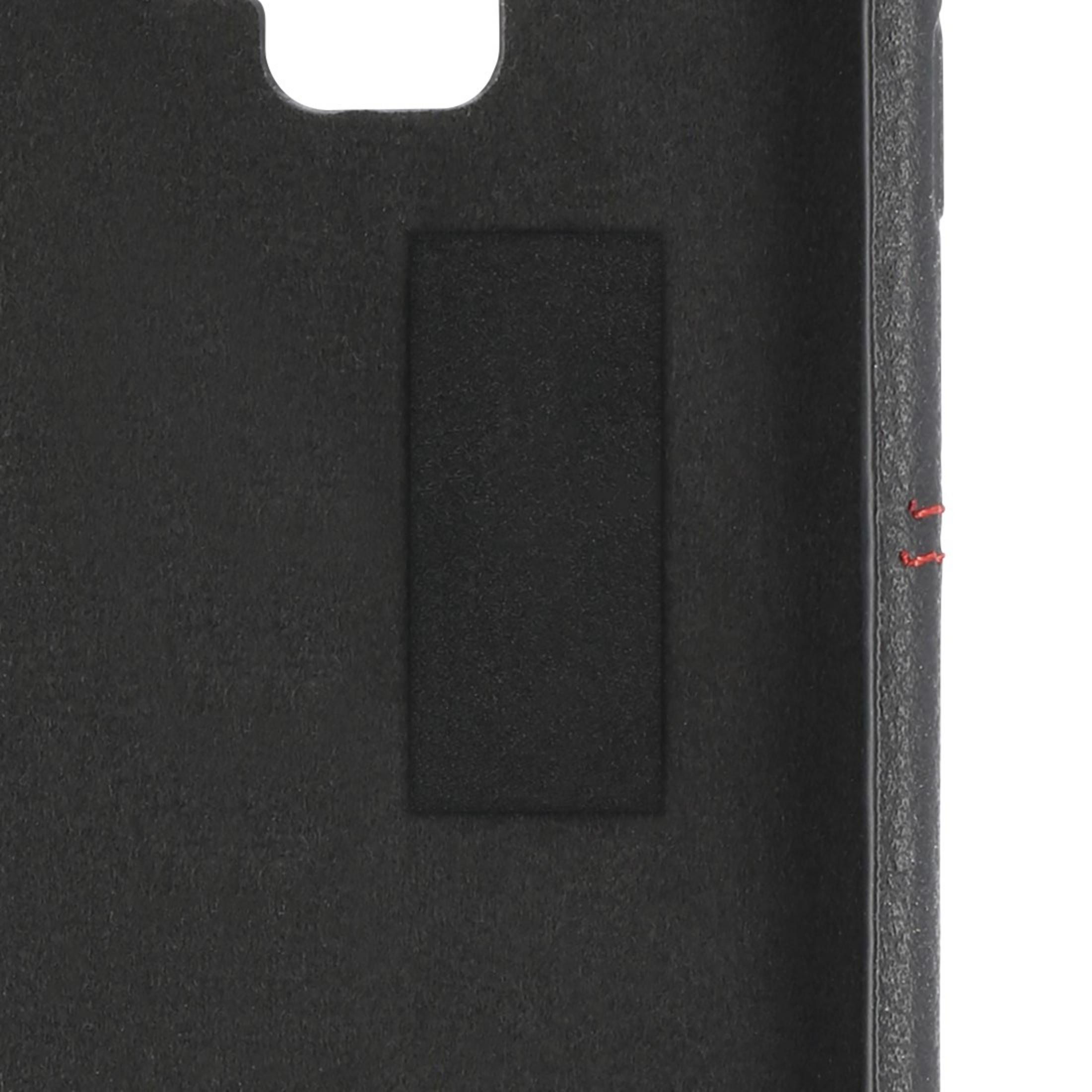 Schwarze Handyhülleninnenseite. Es gibt einen rechteckigen Aufnäher für das Telefon.