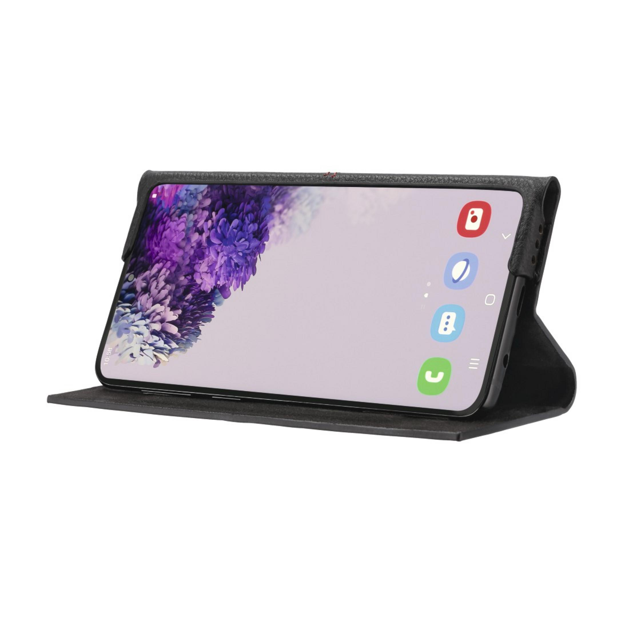 Telefon in schwarzer Hülle, geöffnet. Bildschirm zeigt lila-weißes Bild.