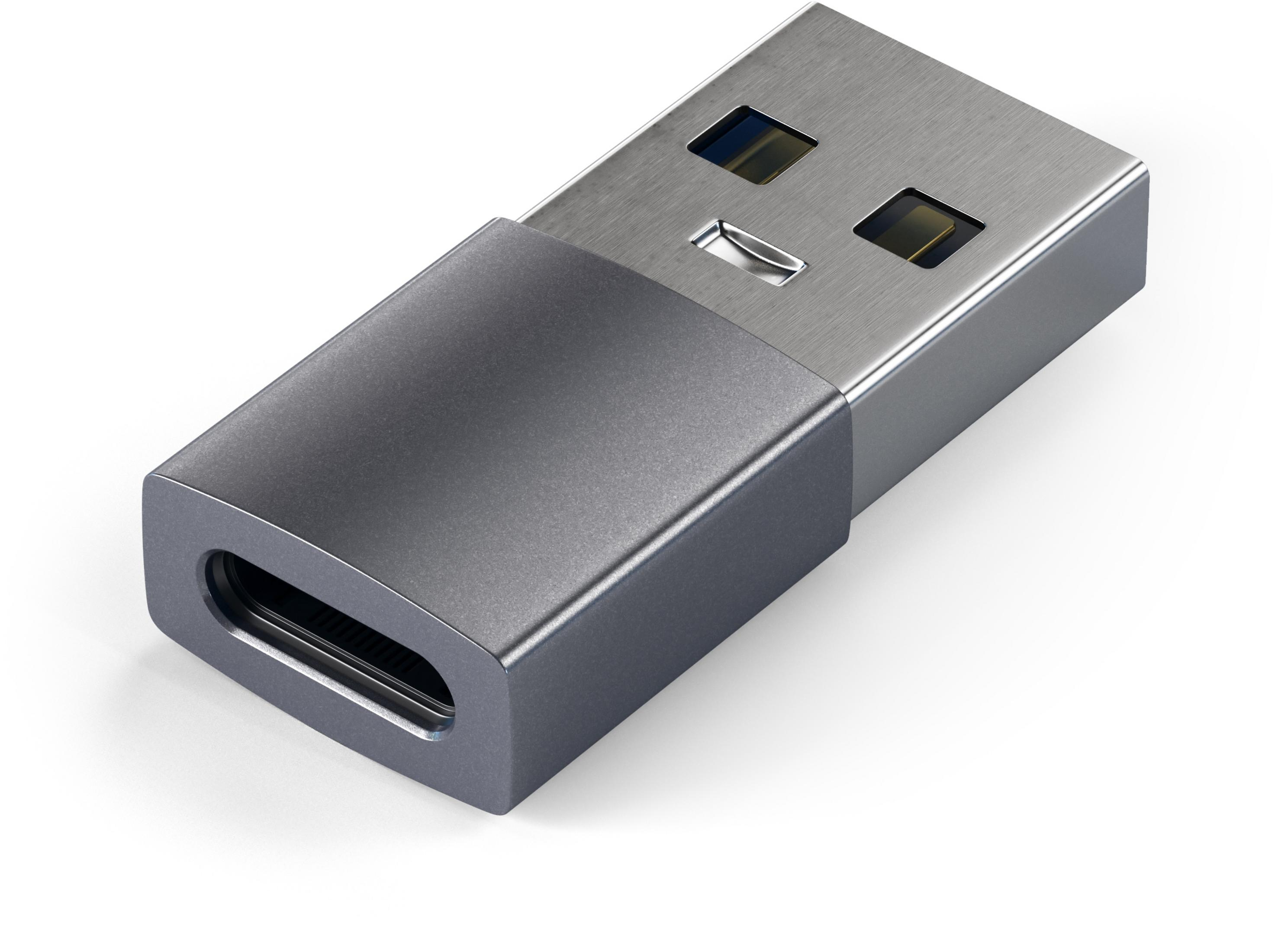 Srebrny adapter USB-C. Szary koniec. Białe tło.