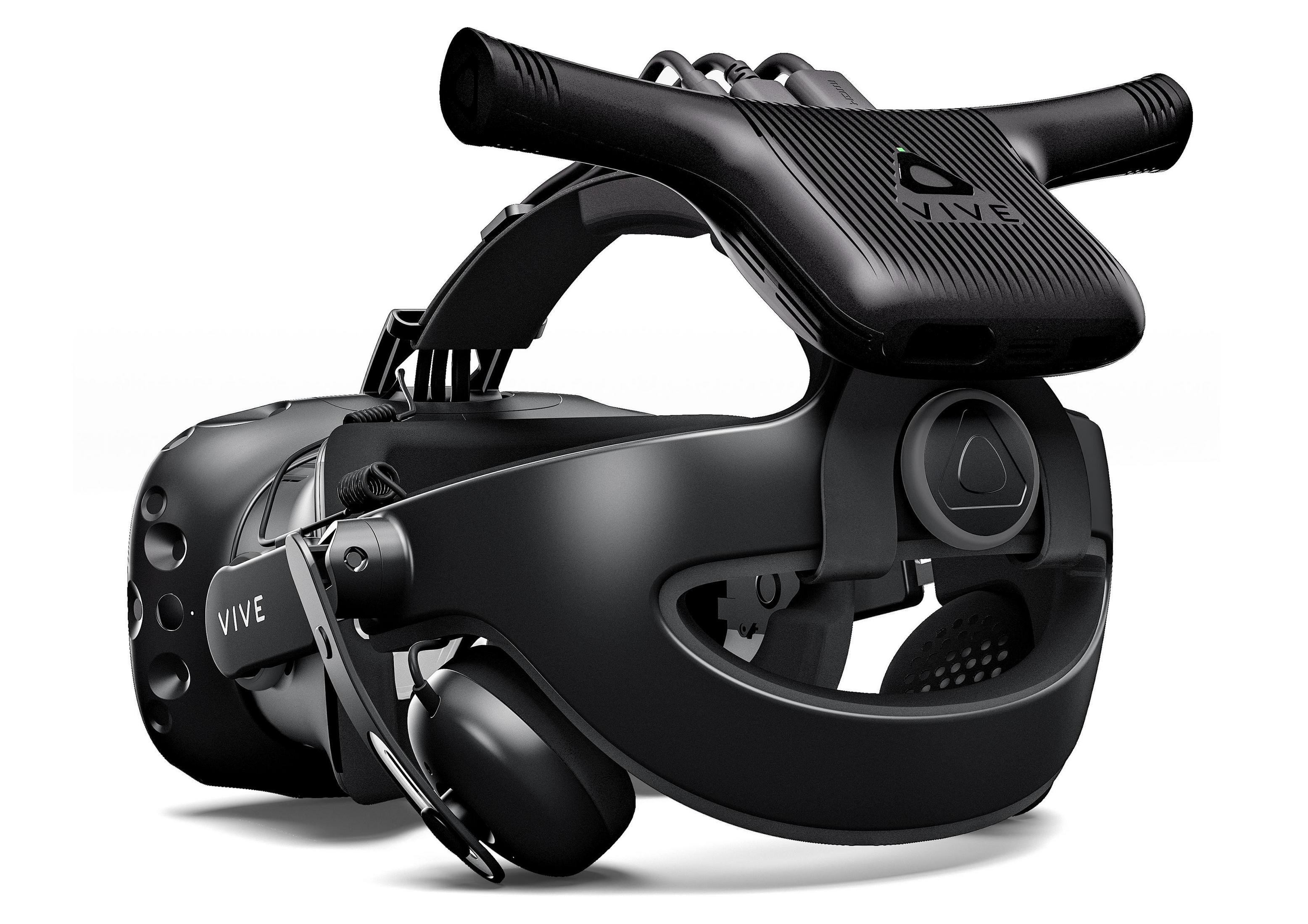 Auriculares VR negros con auriculares y cables adjuntos. Los auriculares están sobre fondo blanco.