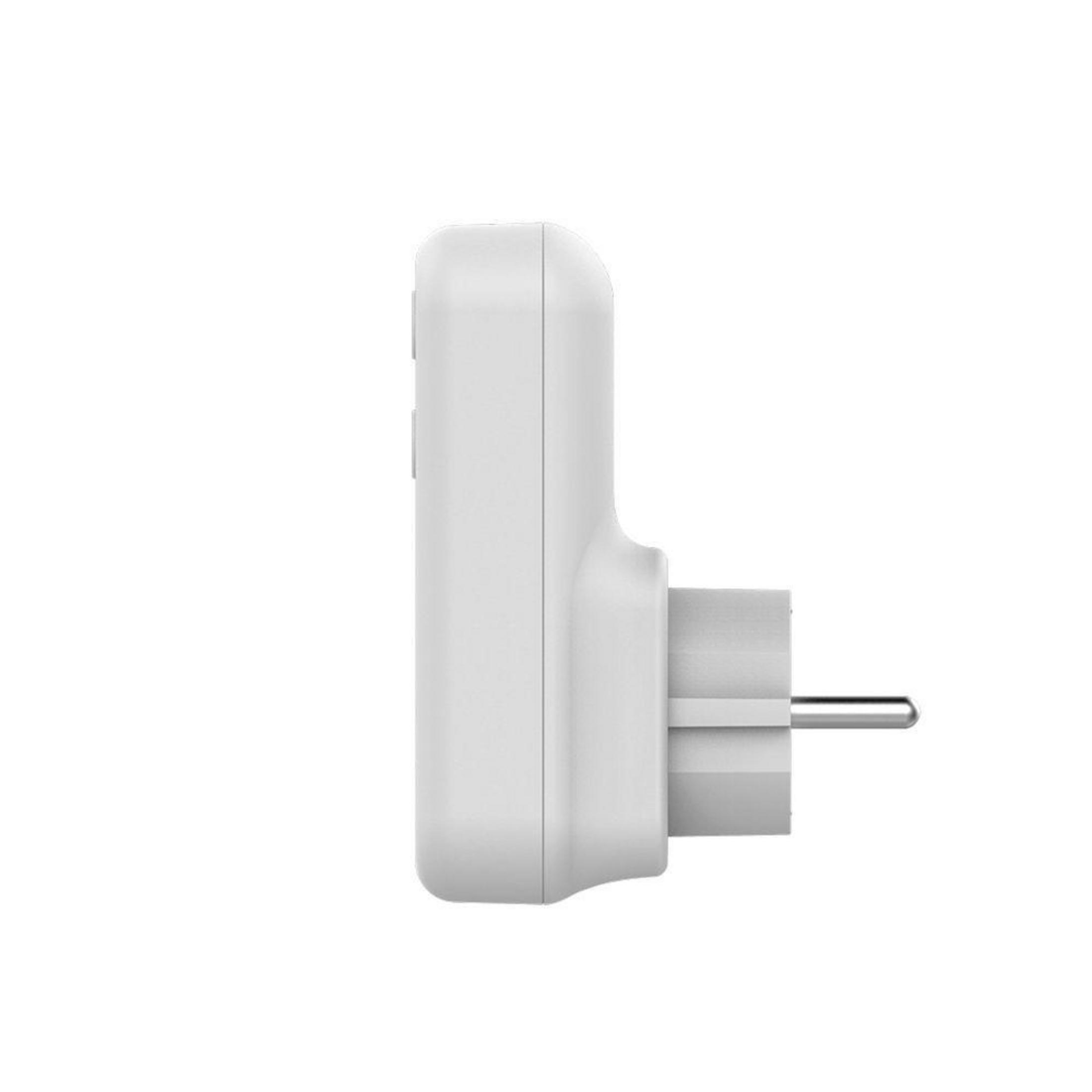 White wall plug adapter. Side view of the adapter with a plug.