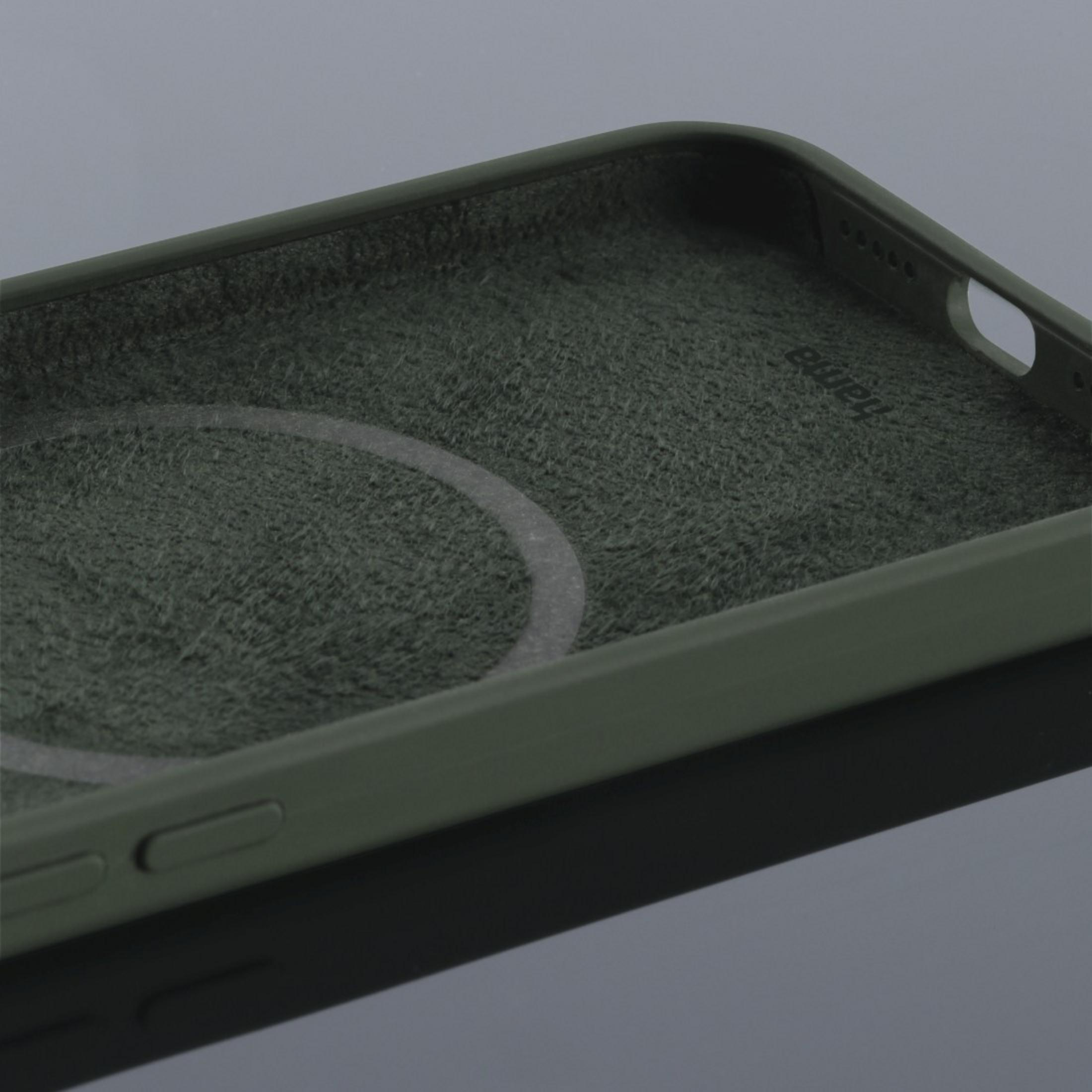 Wnętrze etui na telefon. Kolor zielony. Tło jest czarne i ciemnoszare.