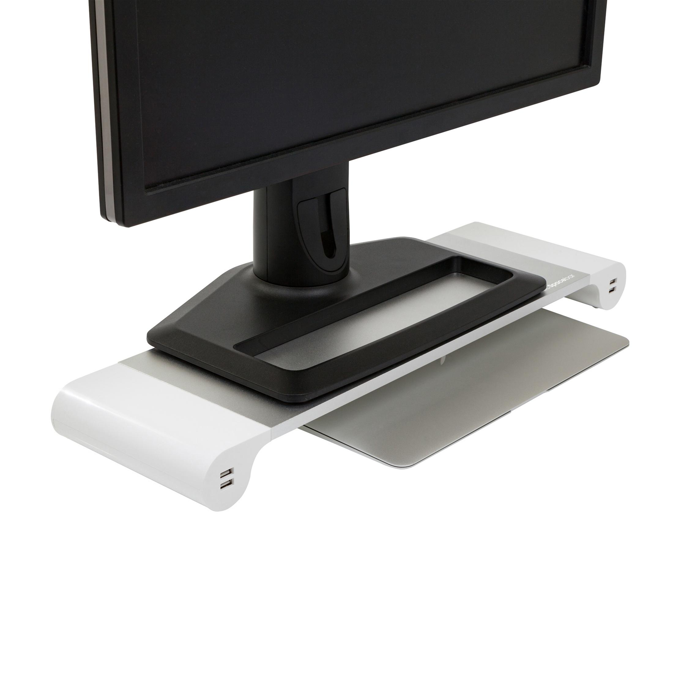 Monitorstandaard met een zwarte voet en een wit plateau. Het heeft USB-poorten aan de voorkant.