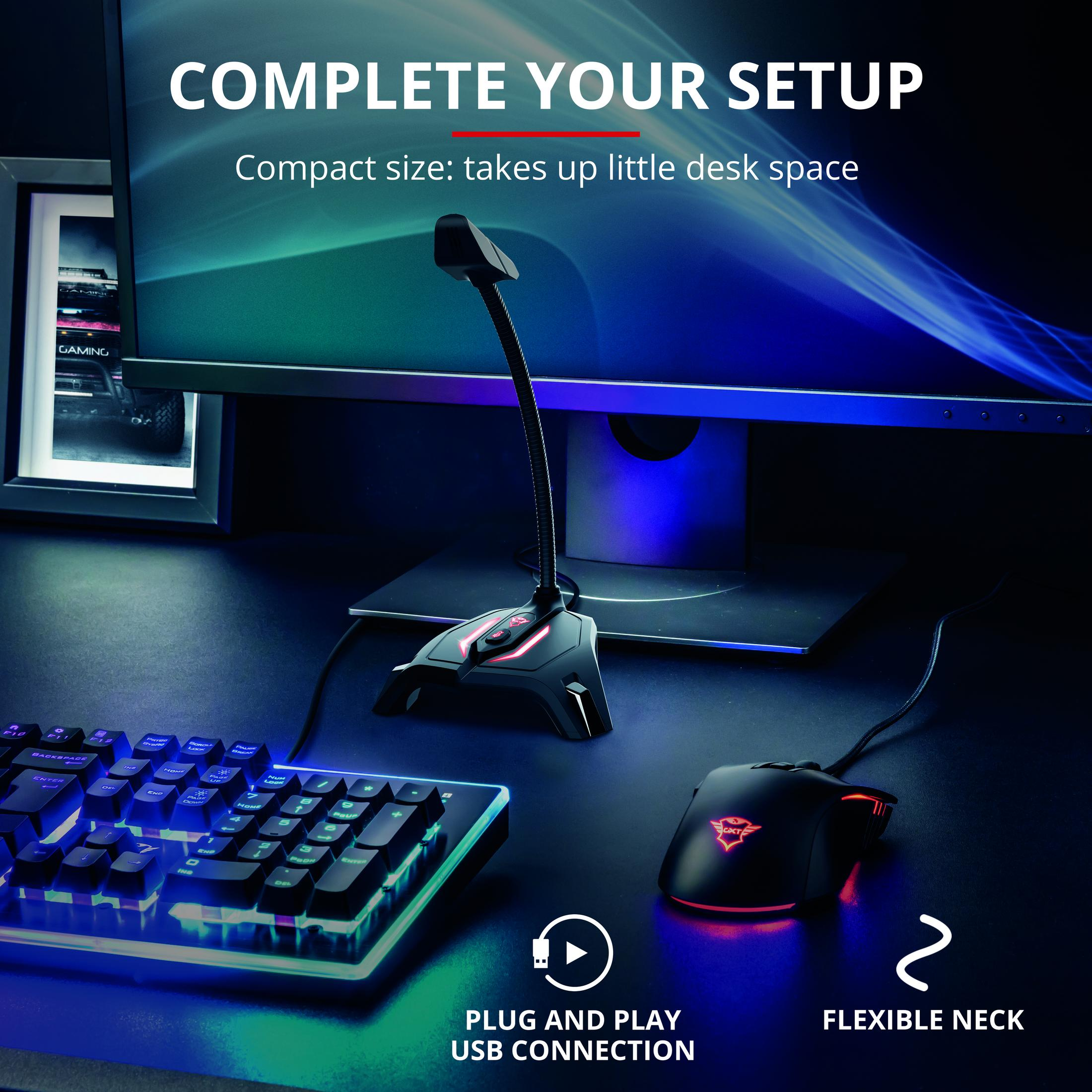 Konfiguracja do gier z monitorem, klawiaturą, myszą i mikrofonem na biurku.