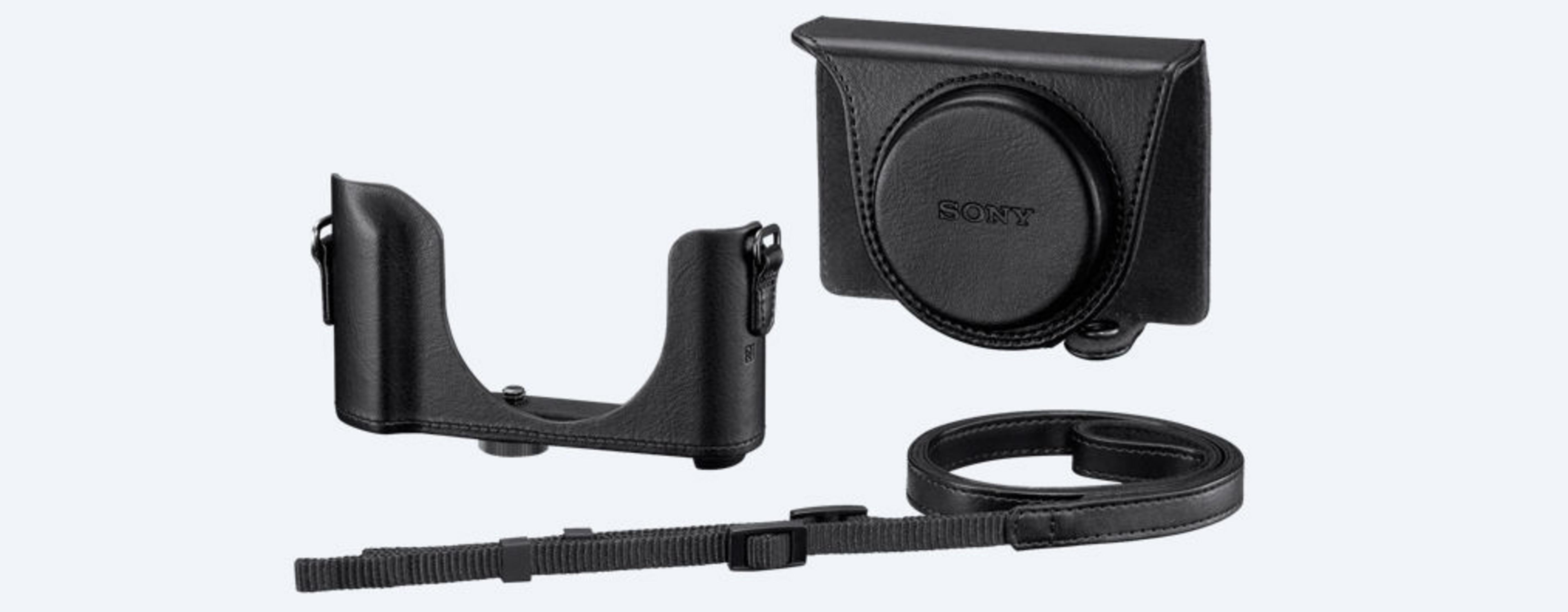 Juego de fundas de cámara de cuero negro: funda, empuñadura y correa. La marca es SONY.