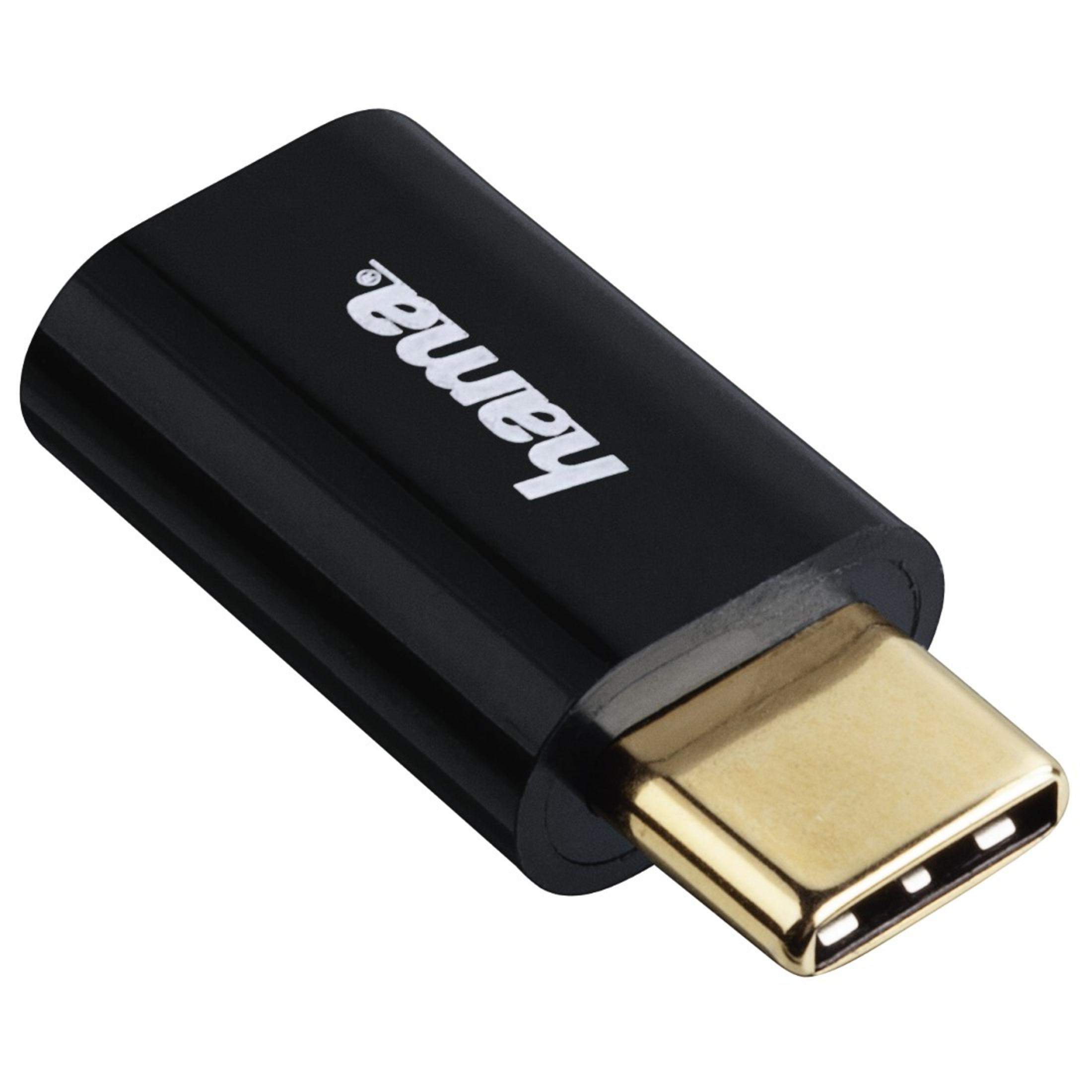 Czarny adapter USB-C ze złotym złączem USB-C.