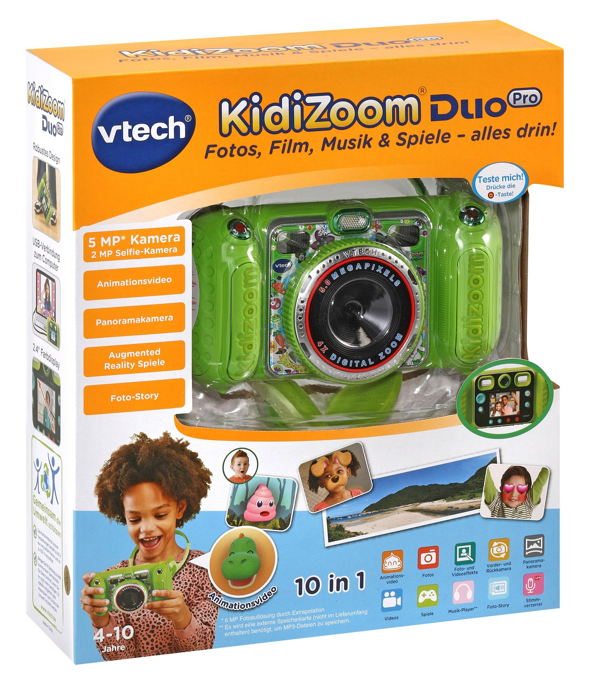 Eine grüne Kidizoom-Kamera in einer Box, mit einem Kind, das sie anschaut. Die Box hat Bilder von Fotos und Videos.
