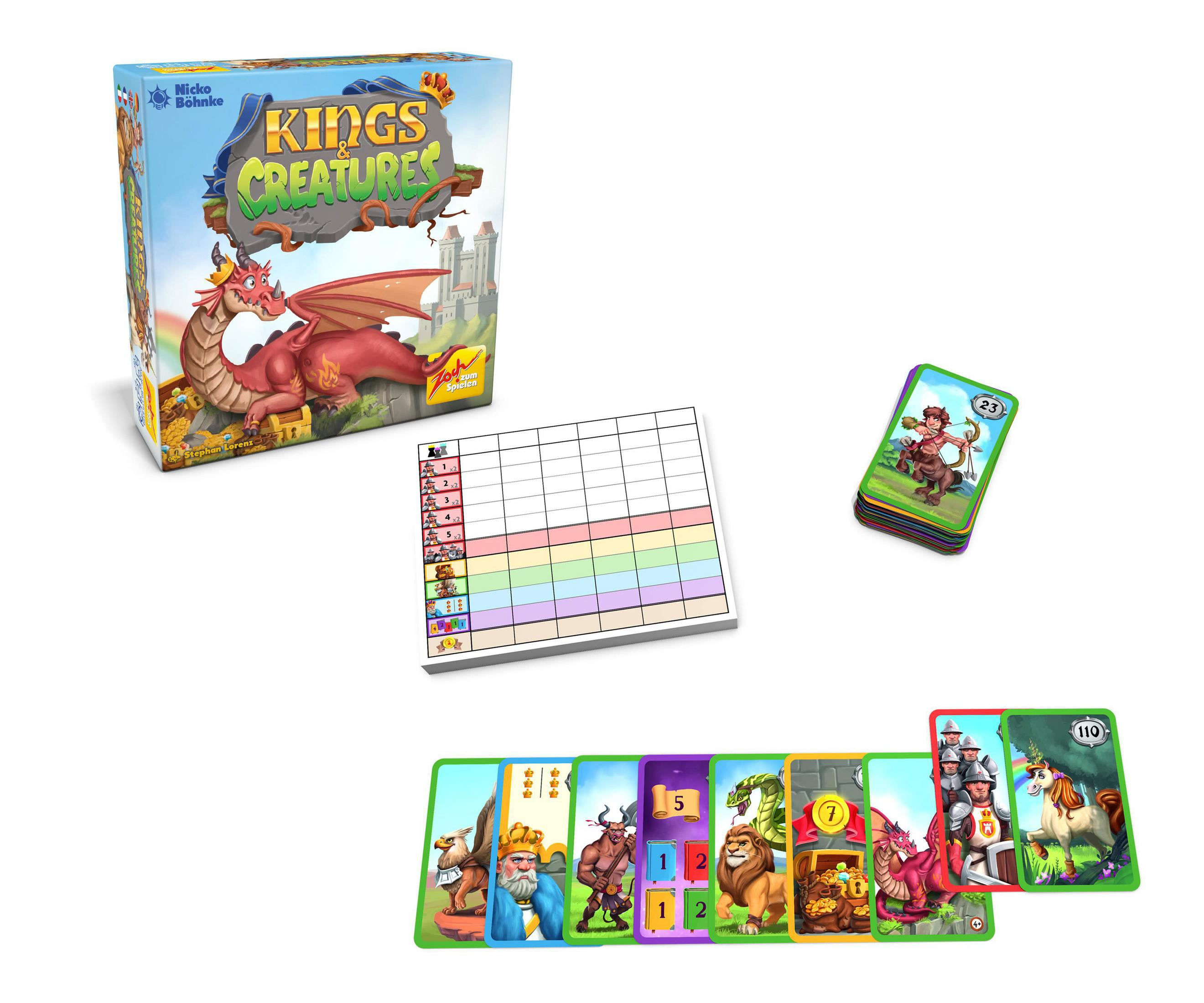Eine Brettspielbox und Komponenten. Die Box zeigt einen Drachen. Karten sind verstreut, mit Illustrationen von Kreaturen.