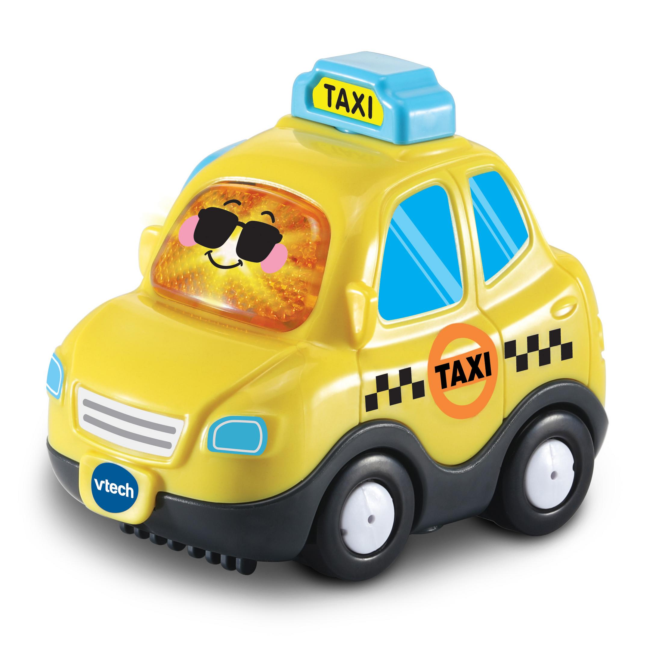 Gelbes Spielzeugtaxi mit lächelndem Gesicht, schwarzer Sonnenbrille und dem Wort TAXI.