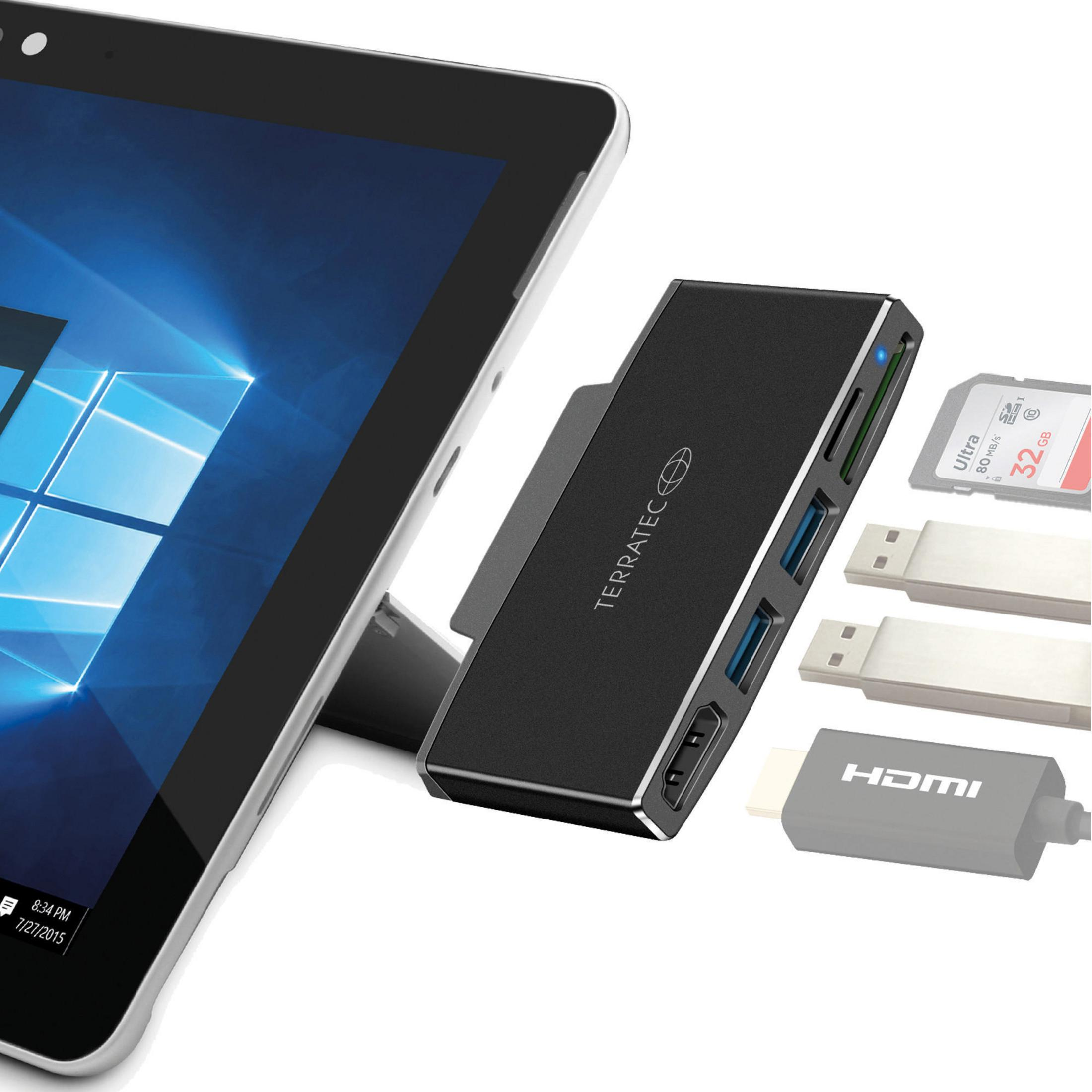 Schwarzer USB-Hub mit Tablet, SD-Karte und USB-Laufwerken. HDMI-Kabel wird ebenfalls gezeigt.
