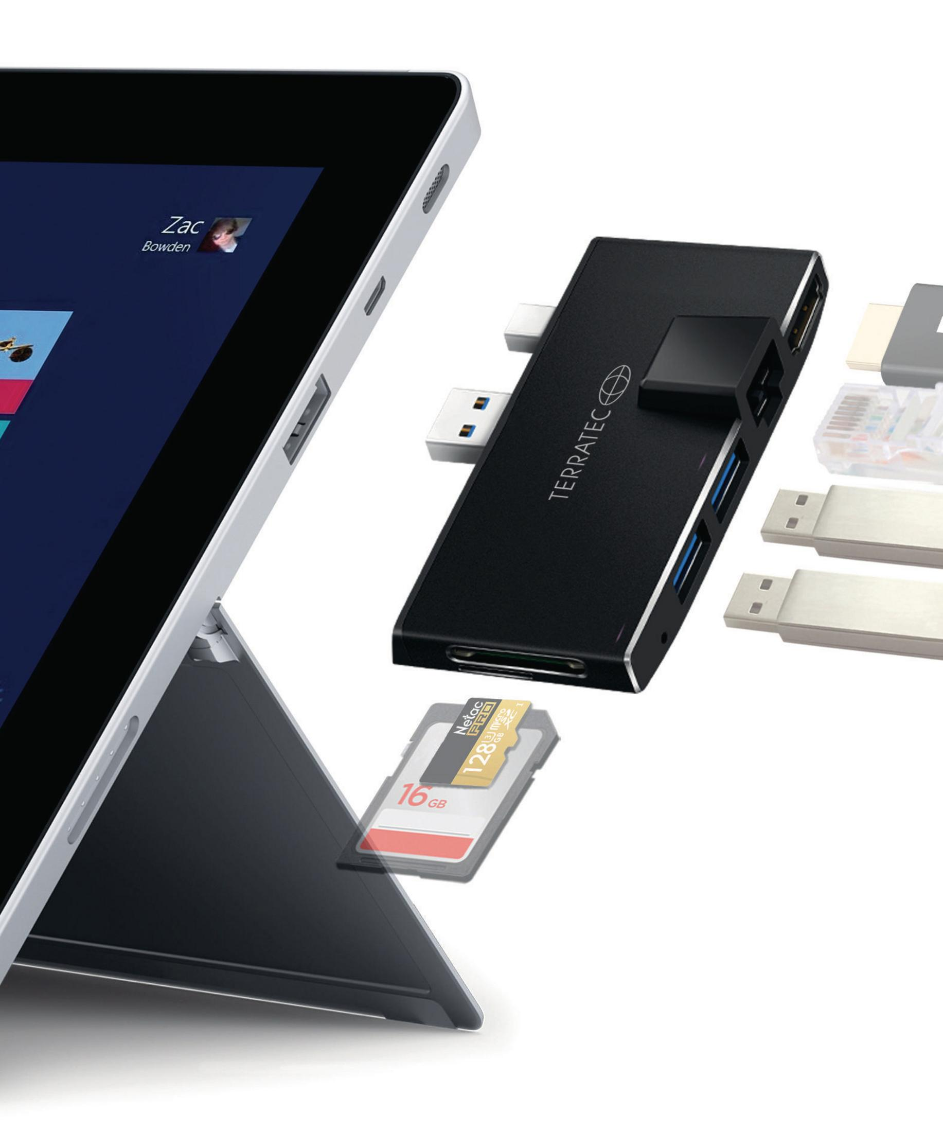 Ein Tablet mit einem schwarzen Hub und einer SD-Karte, die verbunden sind. Ein weißer Hintergrund.